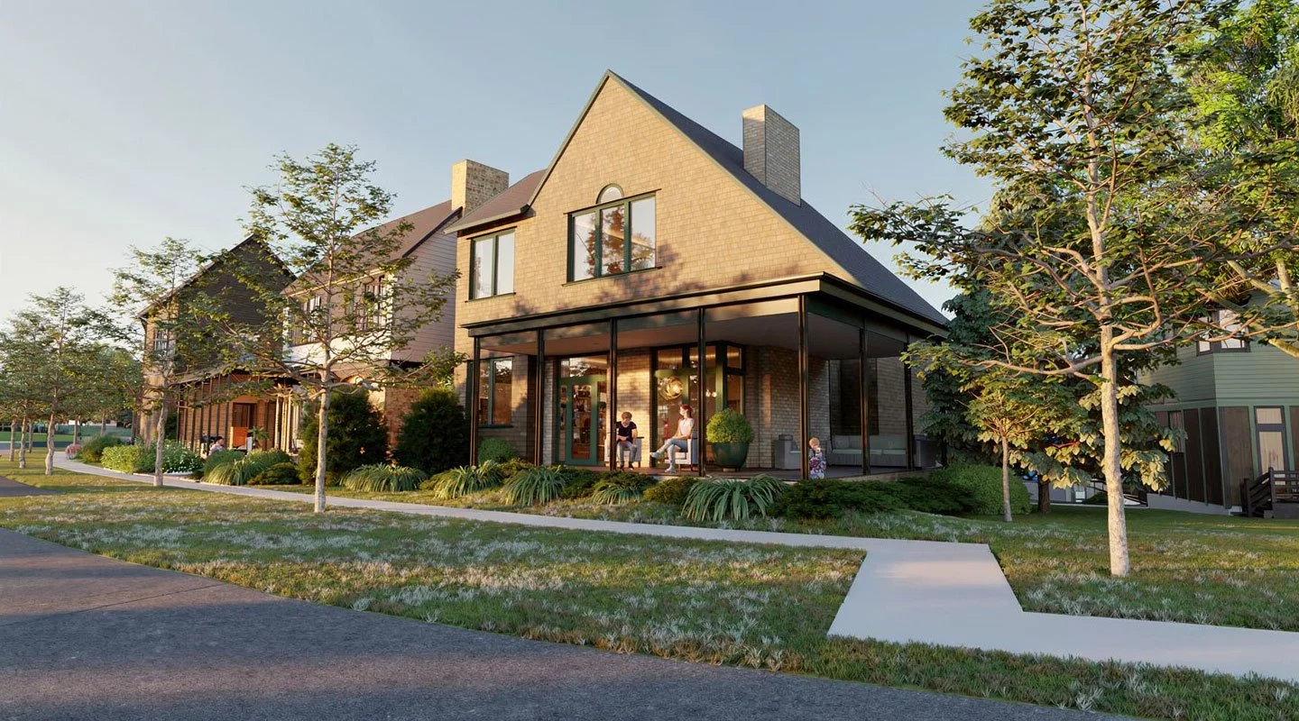 Front view of a modern house with a porch, trees, and a lawn, with people sitting and walking outside during sunset.