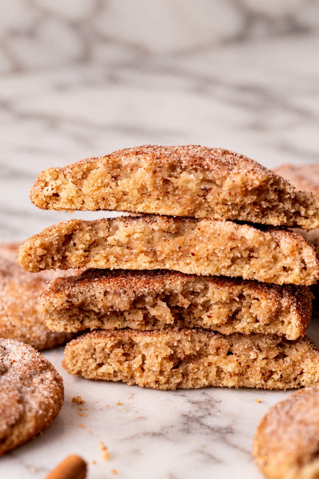 Stacked chai sugar cookies showing soft spiced centers