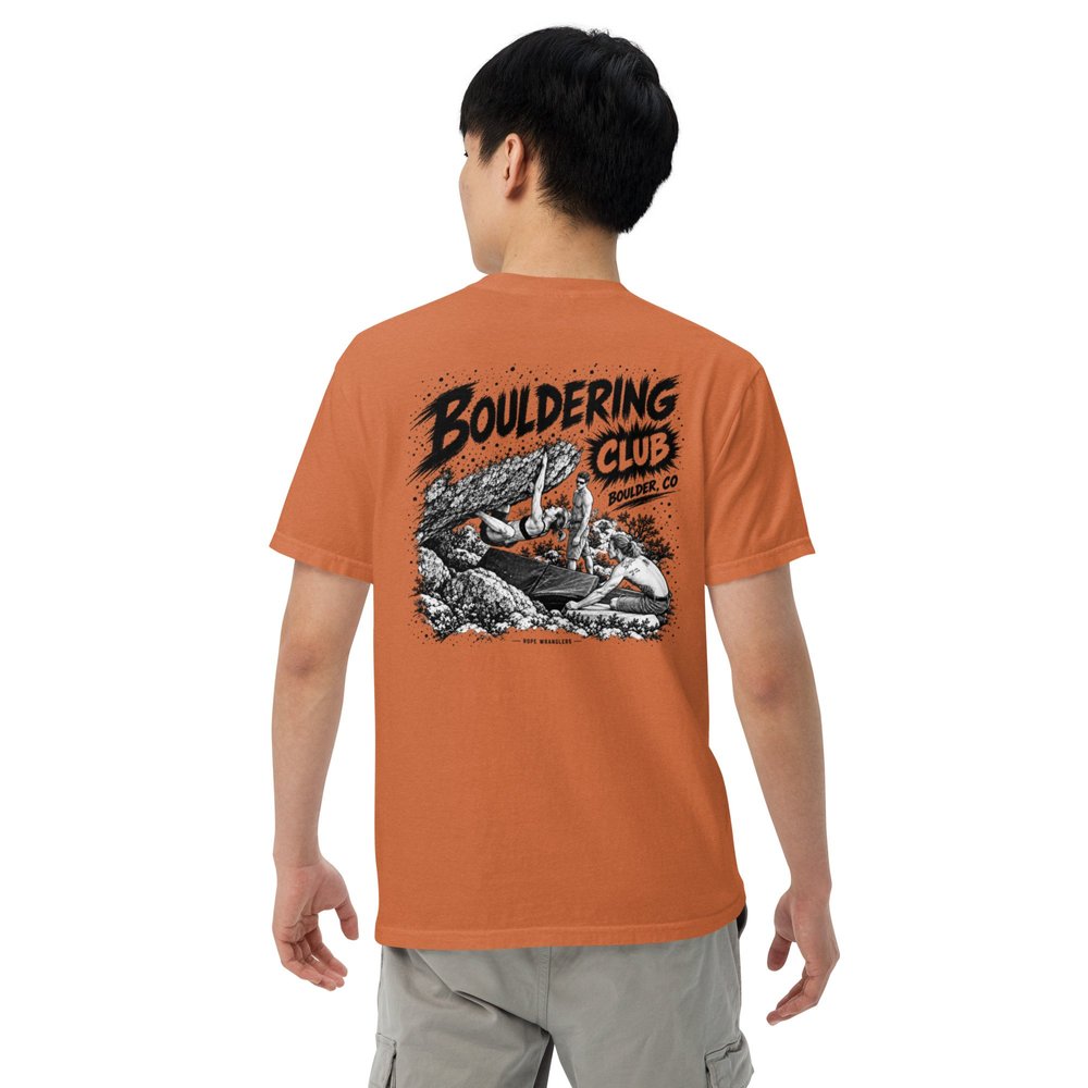 Burnt orange Rope Wranglers Bouldering Social Club shirt showing the large illustrated back design
