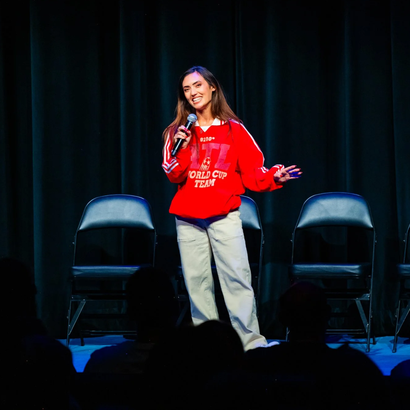 Savannah Louie as a guest host storyteller for Roadtrip Improv in Atlanta, GA.