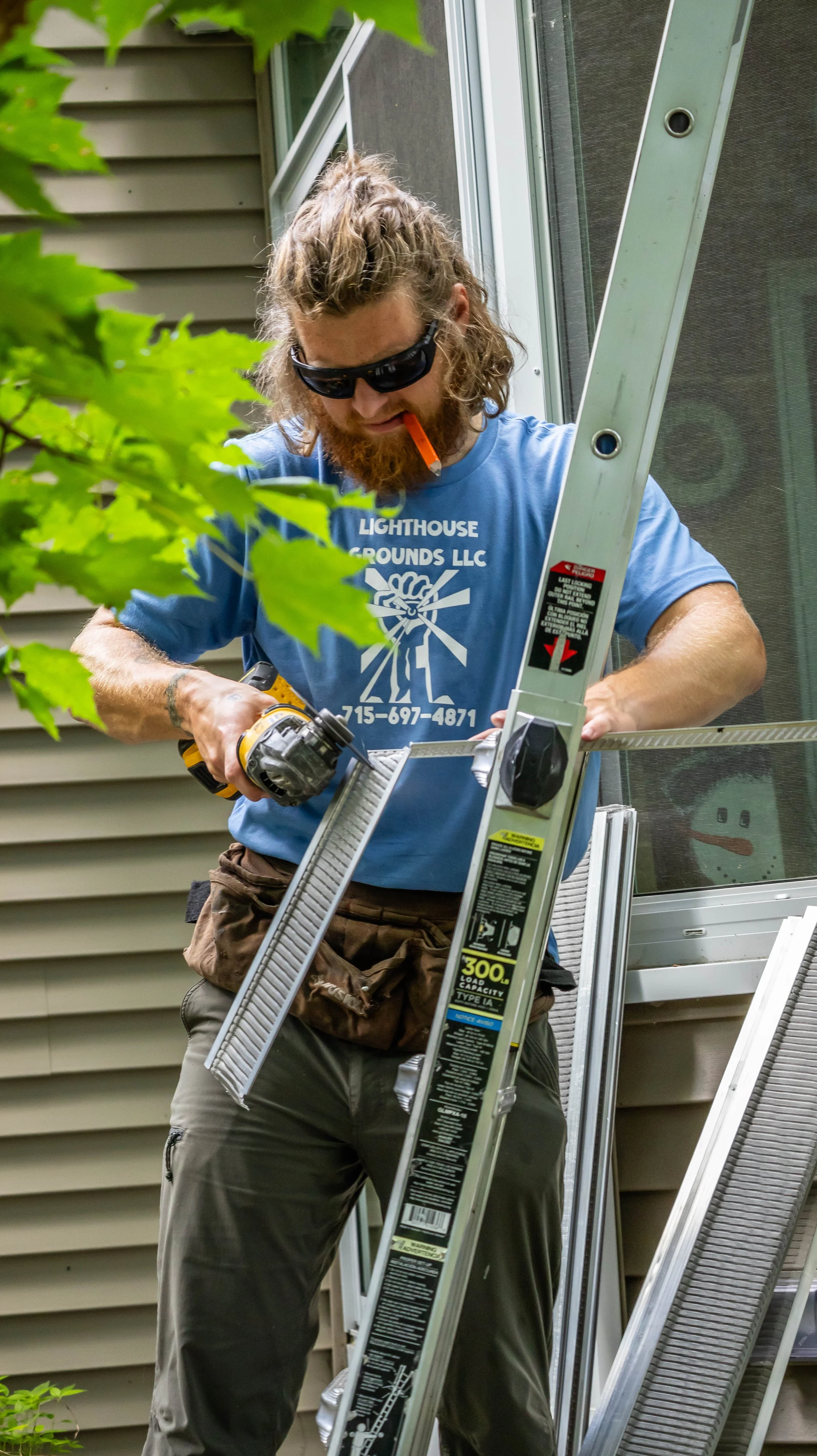 Oranssi technician working on a roof project