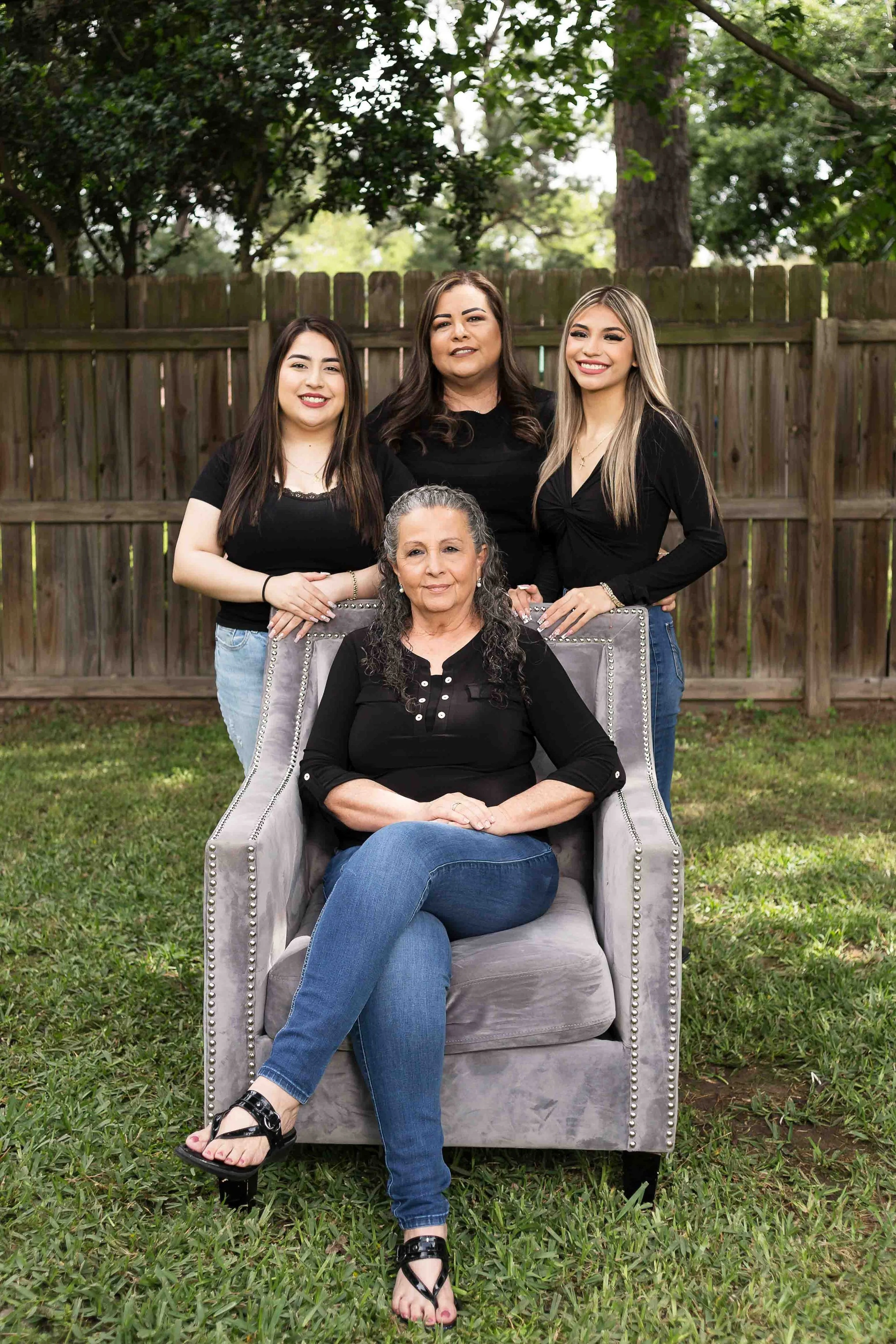 Indoor family portrait in Houston, Texas by Lev’s Photography featuring a family posing together inside their home for a lifestyle session.