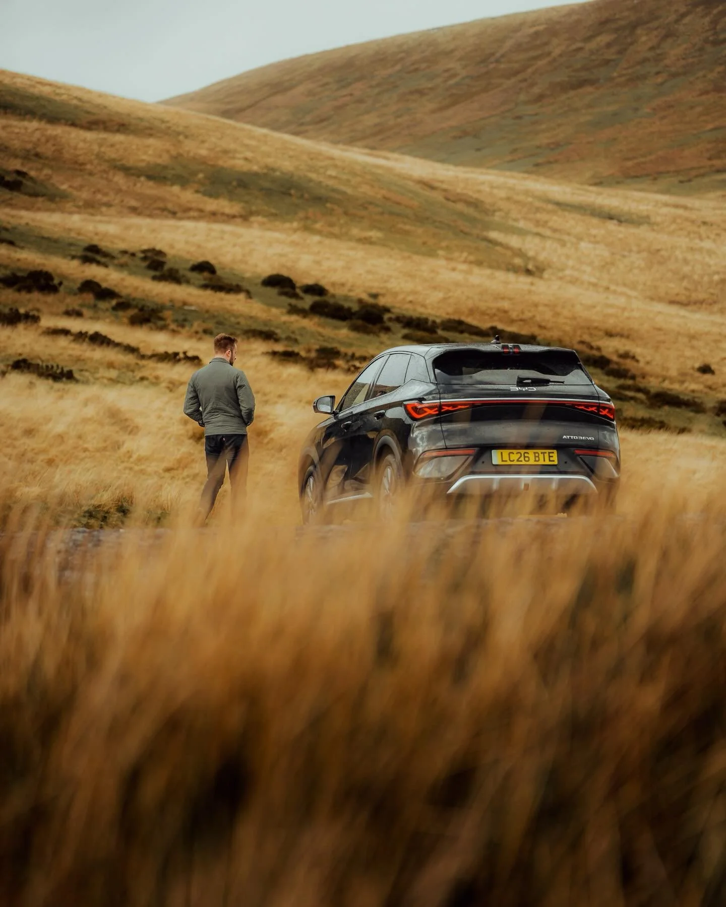 Shooting in the mountains with @BYD.uk and the Atto 3 Evo. 

We had every weather in Bannau Brycheiniog last month. Wales gave us everything. Sleet, hail. Rain and the occasional pocket of sun. Everything shifted quickly and the initial concept for t