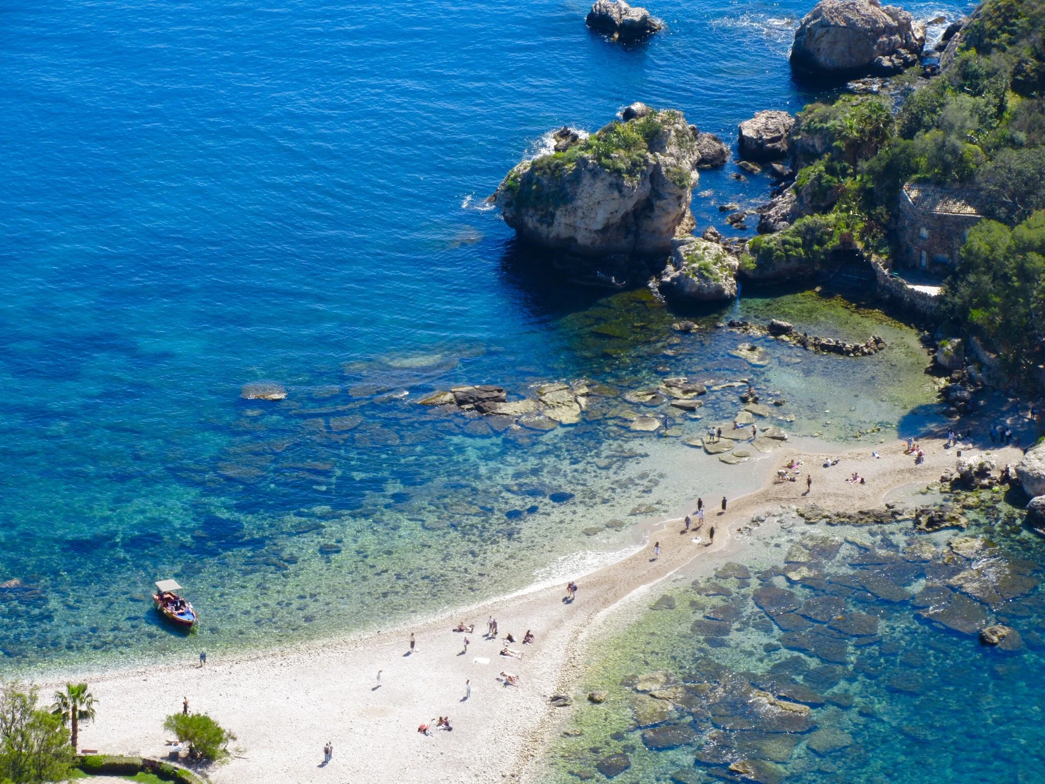 An aerial view of Isola Bella and its beach in Taormina, Sicily.