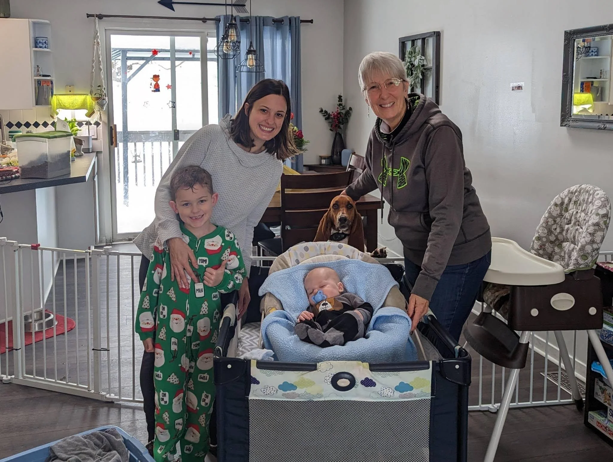 MomsBloom Volunteers helping a family during the postpartum experience in the Grand Rapids area.