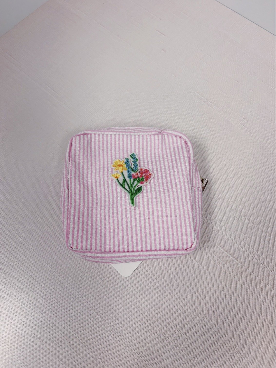 PINK STRIPED SEARSUCKER POUCH
