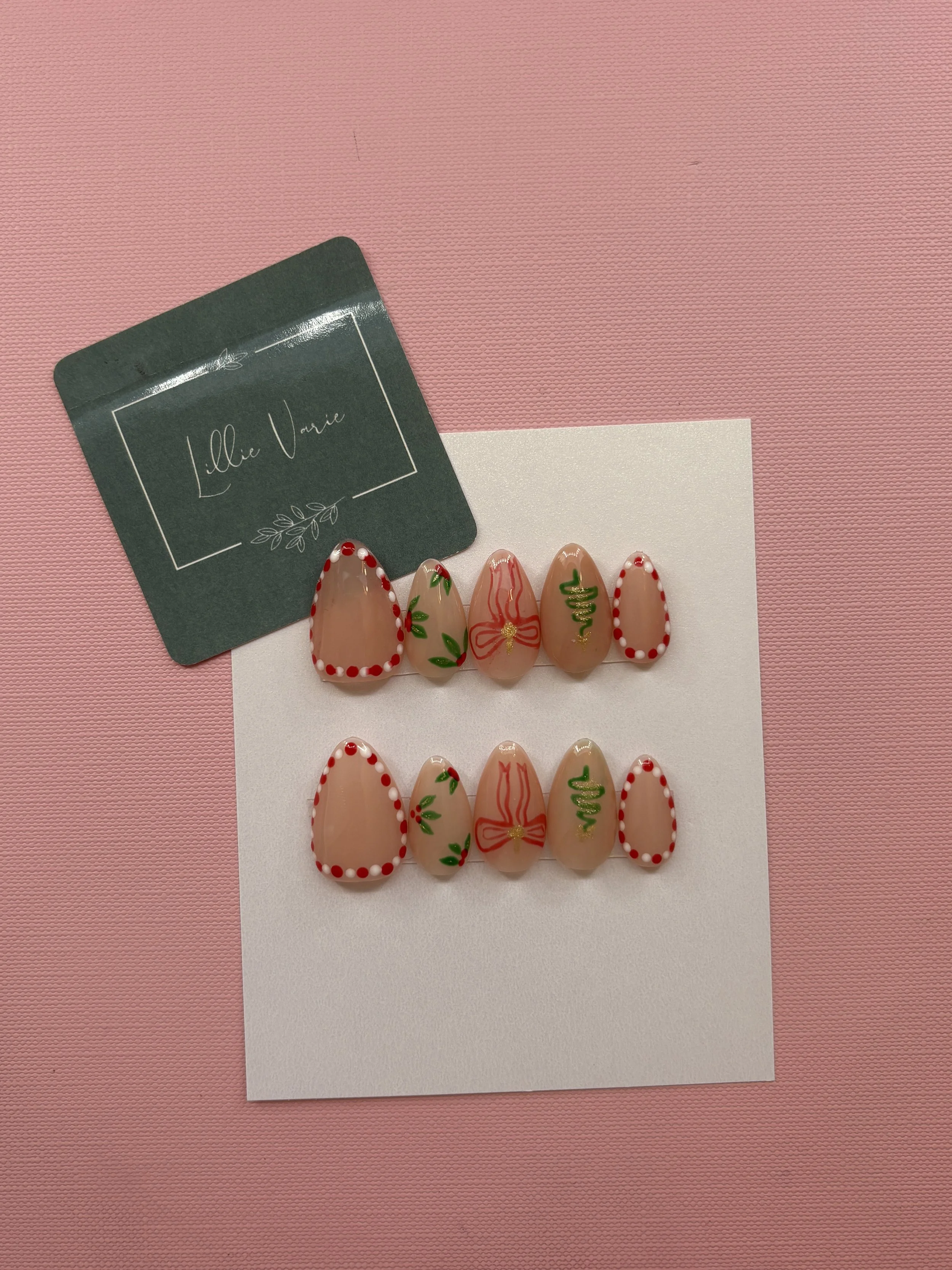 Red ribbon bow nails .JPG