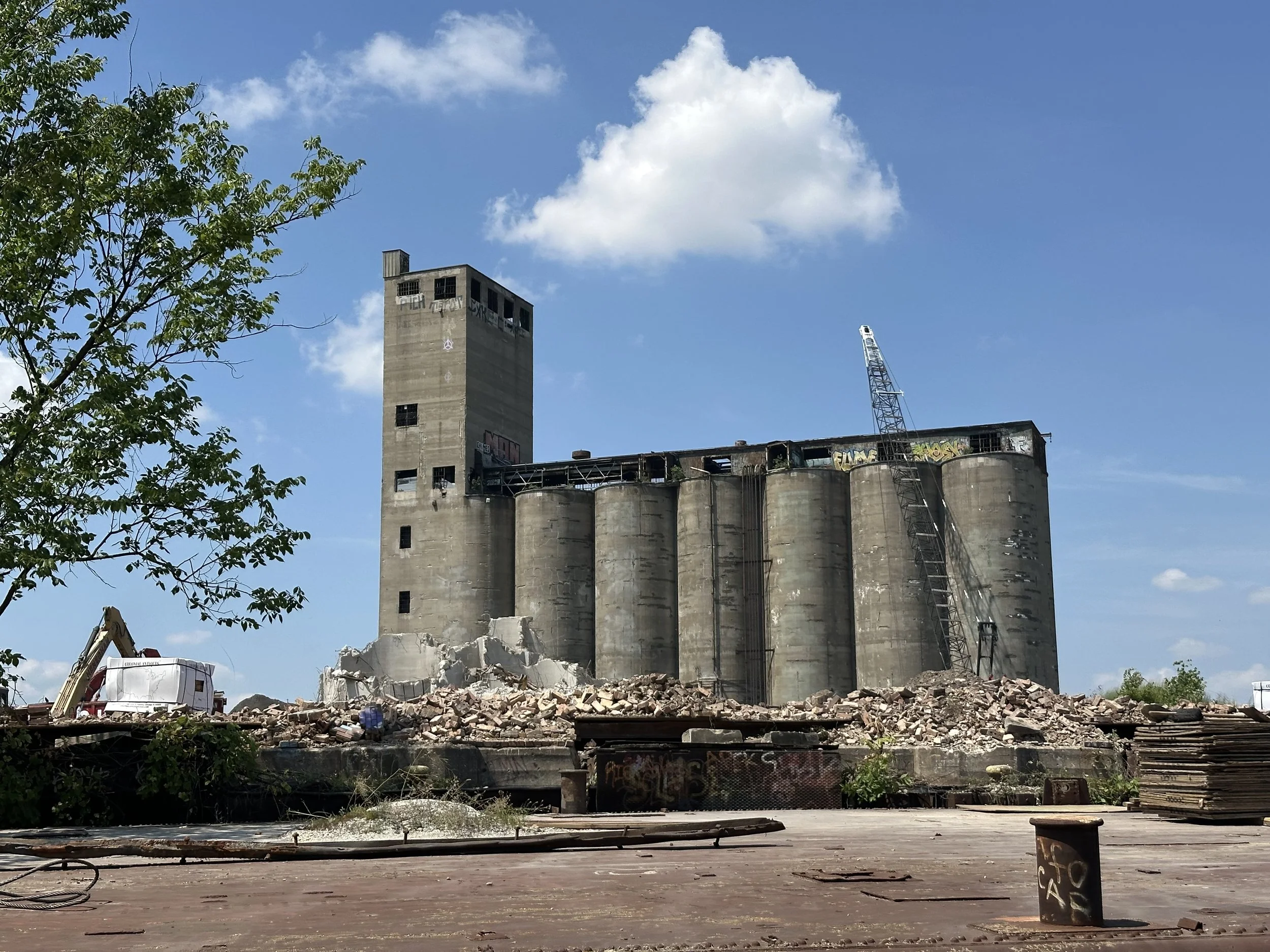 Aug 8: Machines Move Debris, Prepare for Last Silo