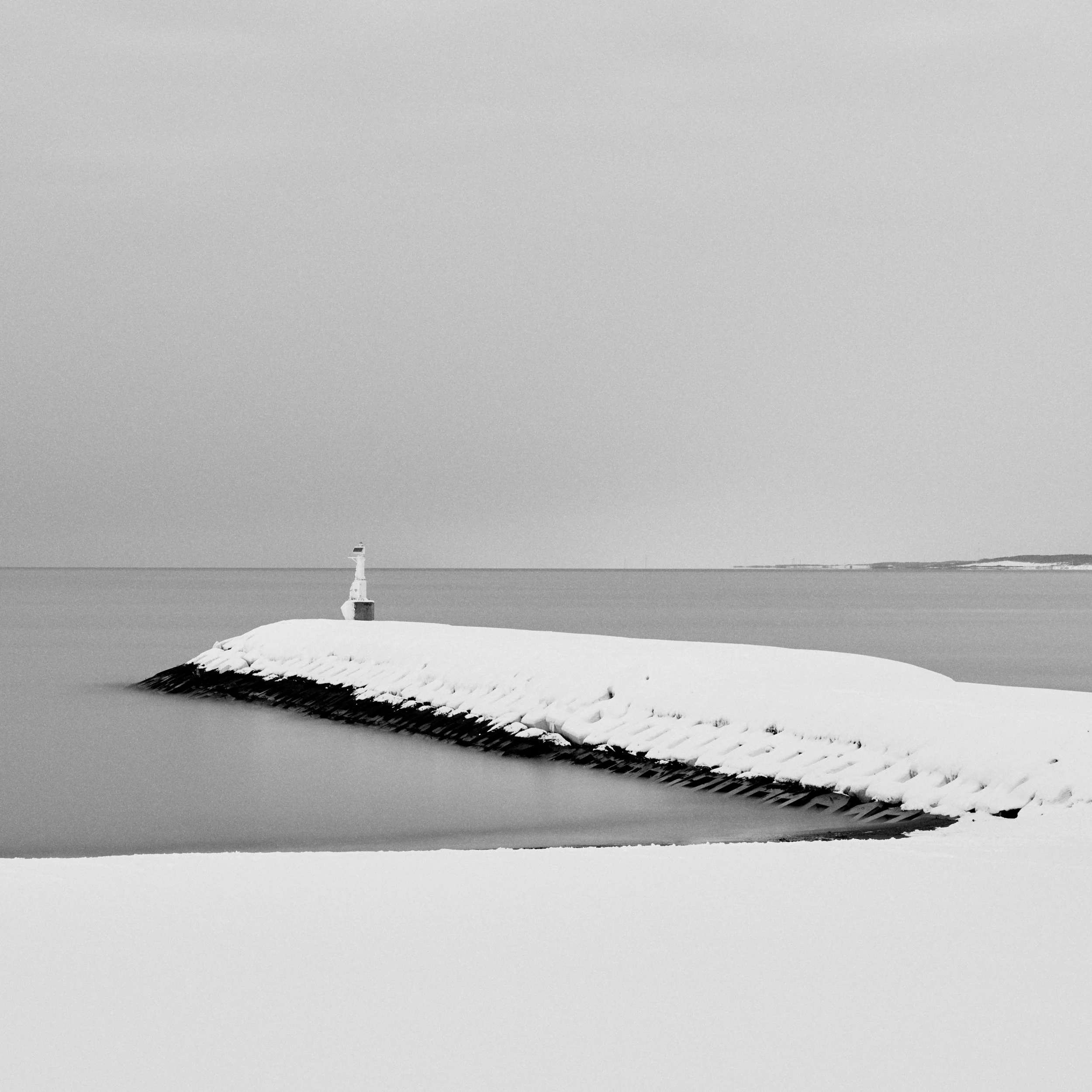  minimalist landscapes + visual simplicity to reduce cognitive load available as limited edition prints    snowy pier 2 shosambetsu, japan. 2026   