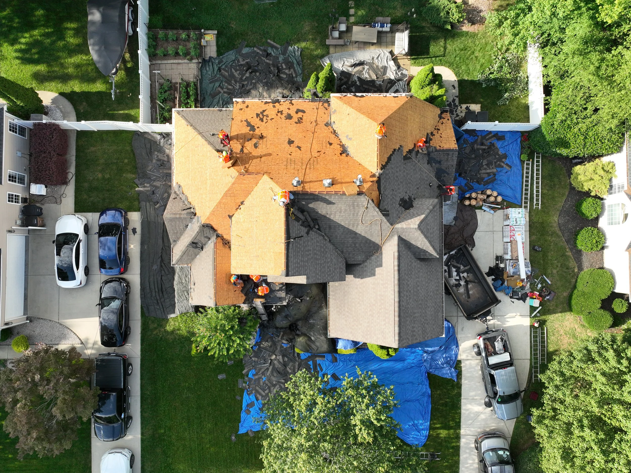 Transforming homes with precision roof replacements. Watch our professional crew strip away old, damaged shingles and install a high-durability roofing system designed to last for decades.
