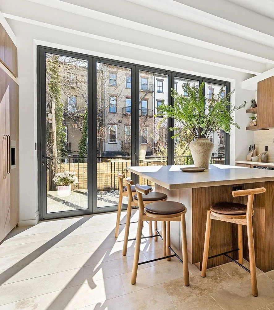 5-Panel Bi-Fold Door Connects Brooklyn Brownstone Kitchen & Patio