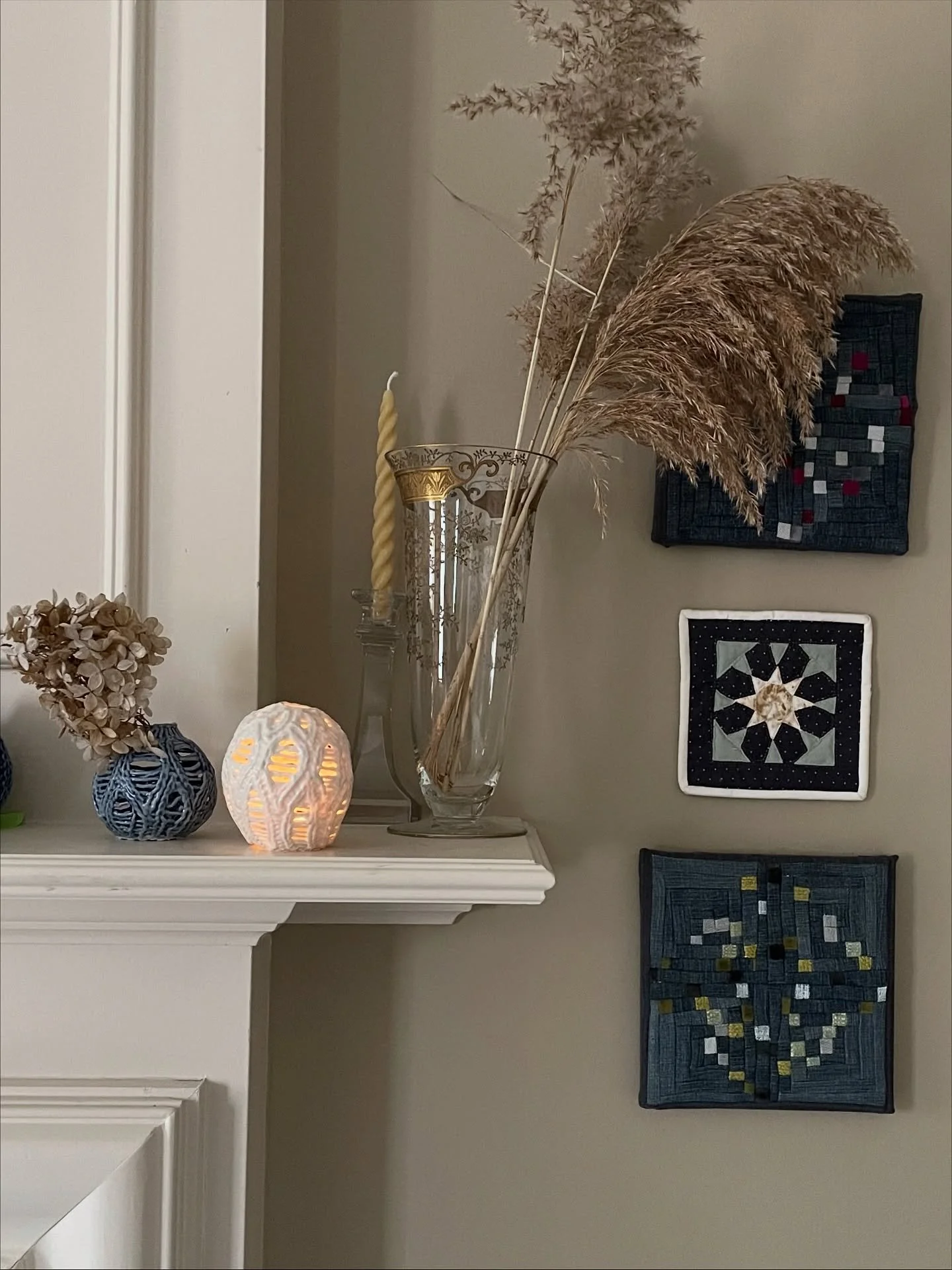 It&rsquo;s dark this morning in Michigan. I love the dark blue luminaries at night, but the white and lighter ones really shine during the day. ✨ 🧶 
.
[details for makers] part of making these is letting go of control. As all potters know, that last