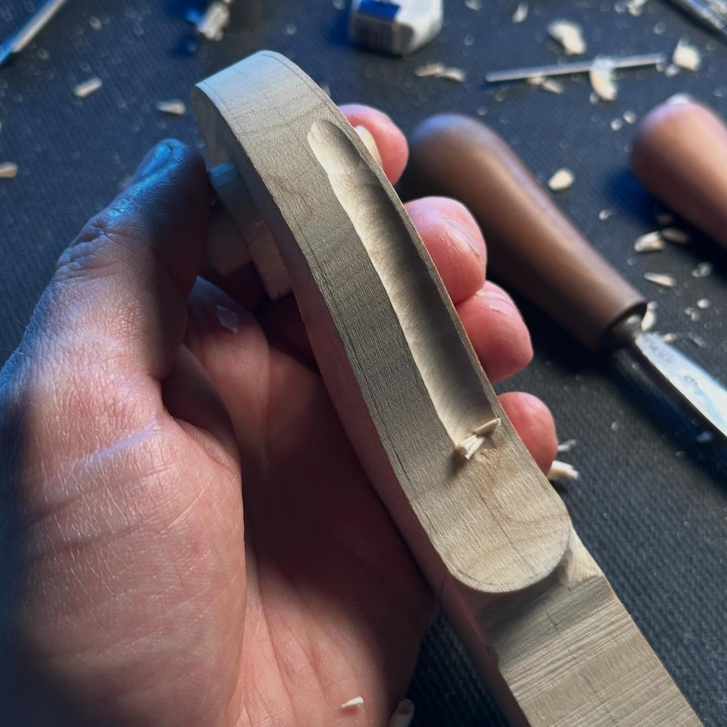 Fluting the back of a violin scroll