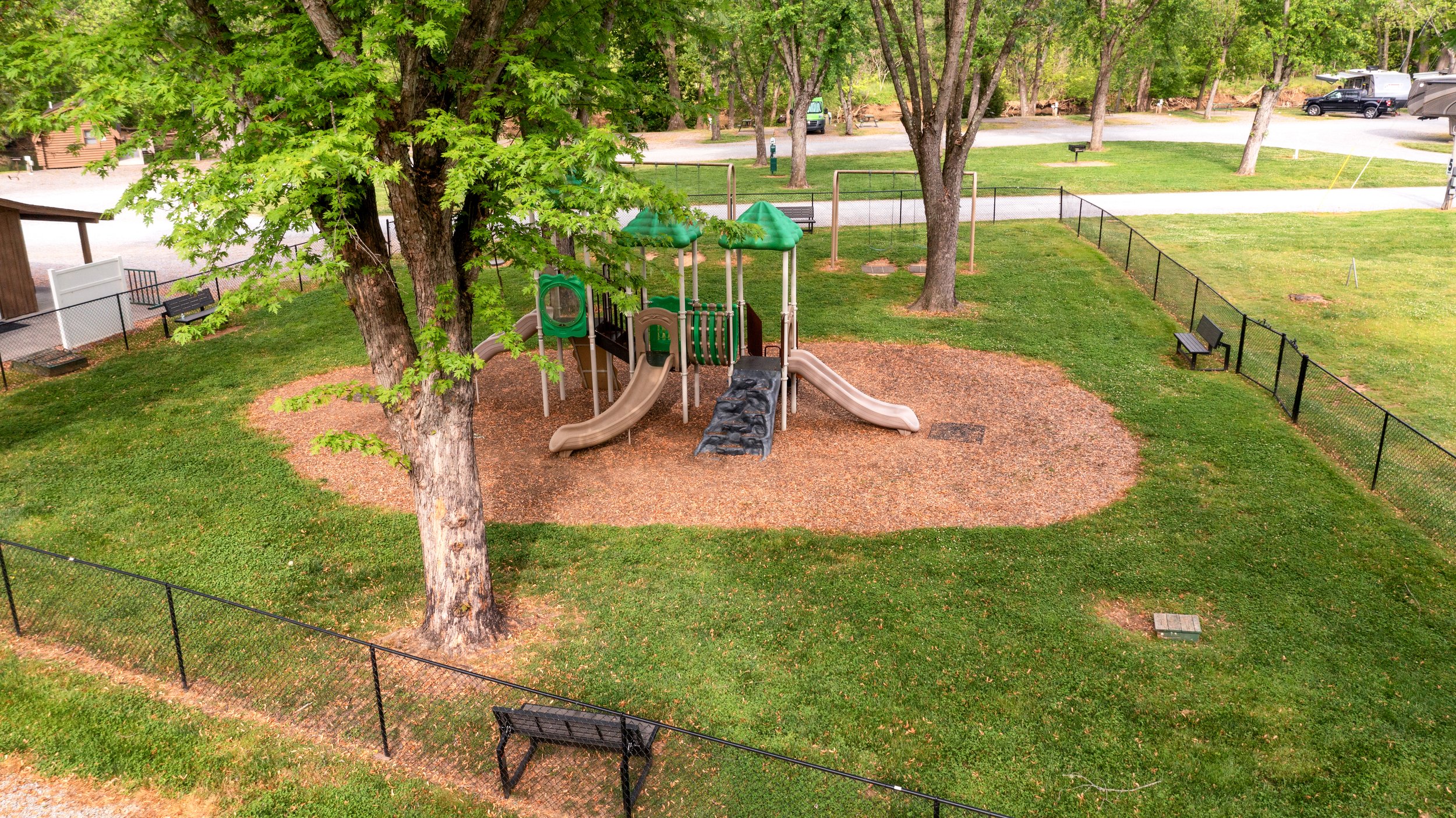 Sevierville, Tennessee, Pigeon Forge, Smoky Mountains, Rv Park & Resort, RV Campground, Cabins, Riverside, Little Pigeon River, Pool, Walking Trail, Pickleball, Bathhouse, Gaga Ball, Family friendly, Laundry Room, Washer and Dryers, Pickleball Courts