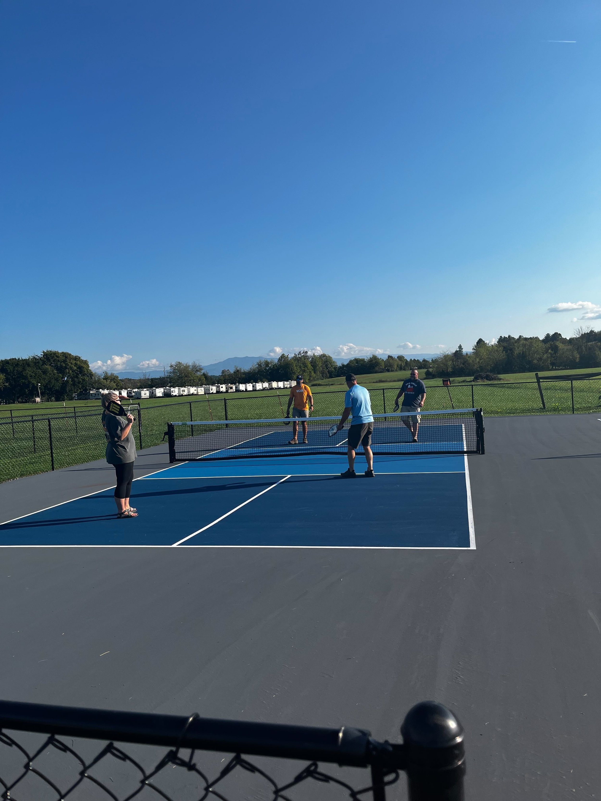 Sevierville, Tennessee, Pigeon Forge, Smoky Mountains, Rv Park & Resort, RV Campground, Cabins, Riverside, Little Pigeon River, Pool, Walking Trail, Pickleball, Bathhouse, Gaga Ball, Family friendly, Laundry Room, Washer and Dryers, Pickleball Courts