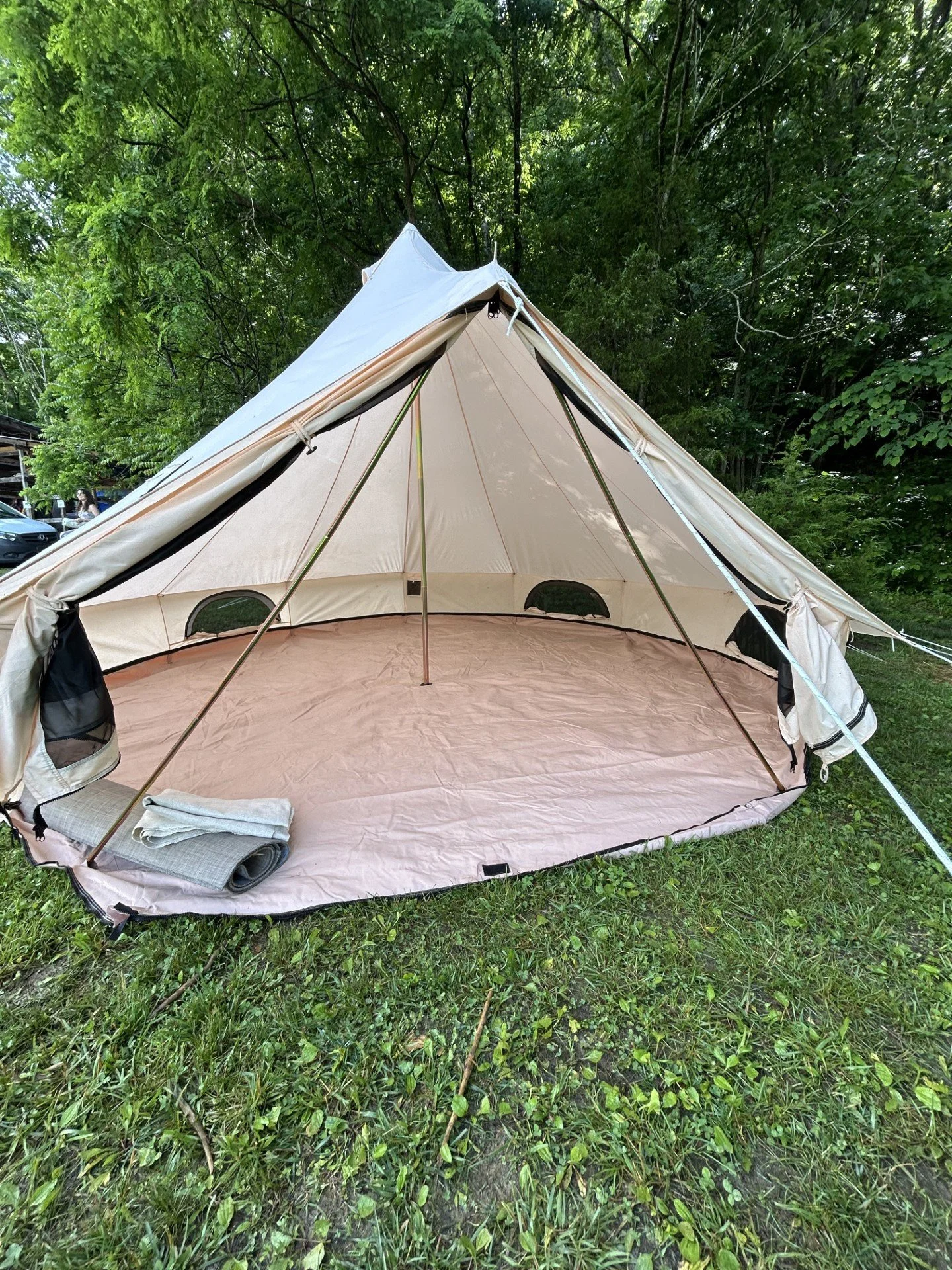 Weather-resistant festival tents prepared for a weekend outdoor event