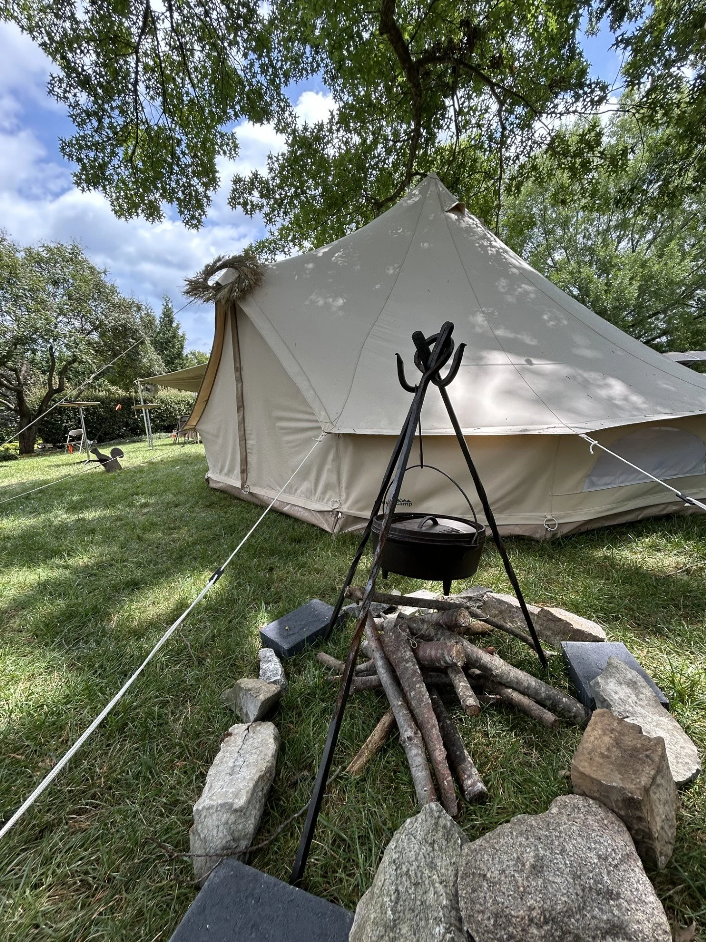 Outdoor family gathering tent rental set up in a backyard in Roanoke, Virginia, providing a comfortable space for reunions and celebrations