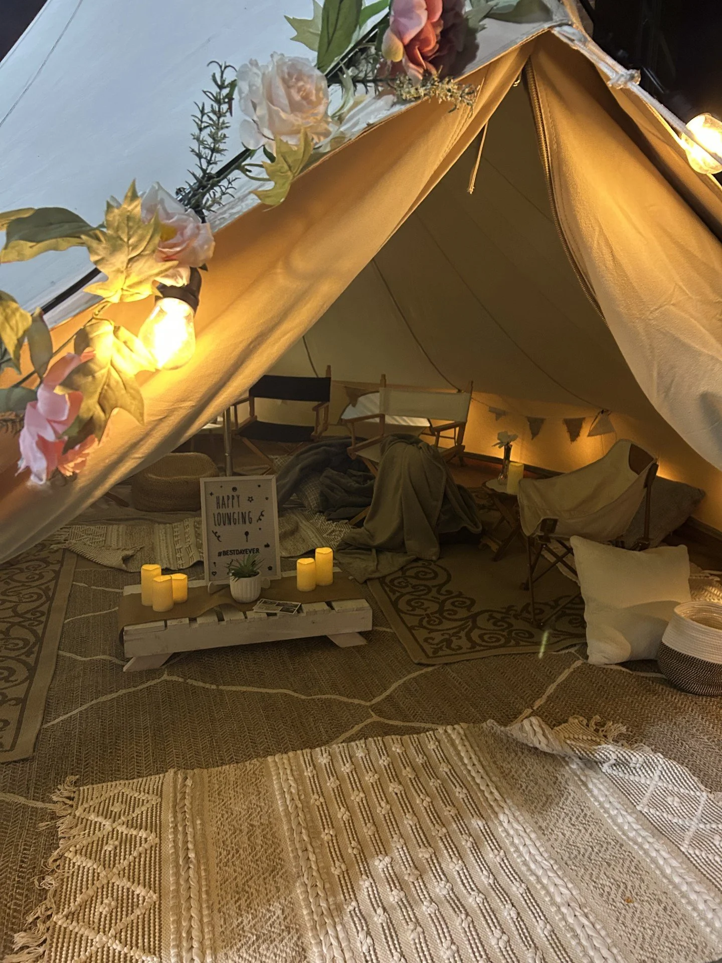 Spacious glamping tent set up for a family gathering and shared celebration