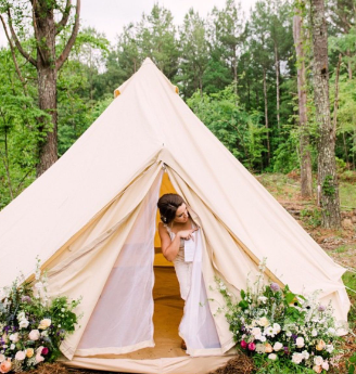 Bride getting ready inside a private wedding tent rental before an outdoor ceremony