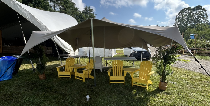 Fully set stretch tent ready for an outdoor event in Virginia