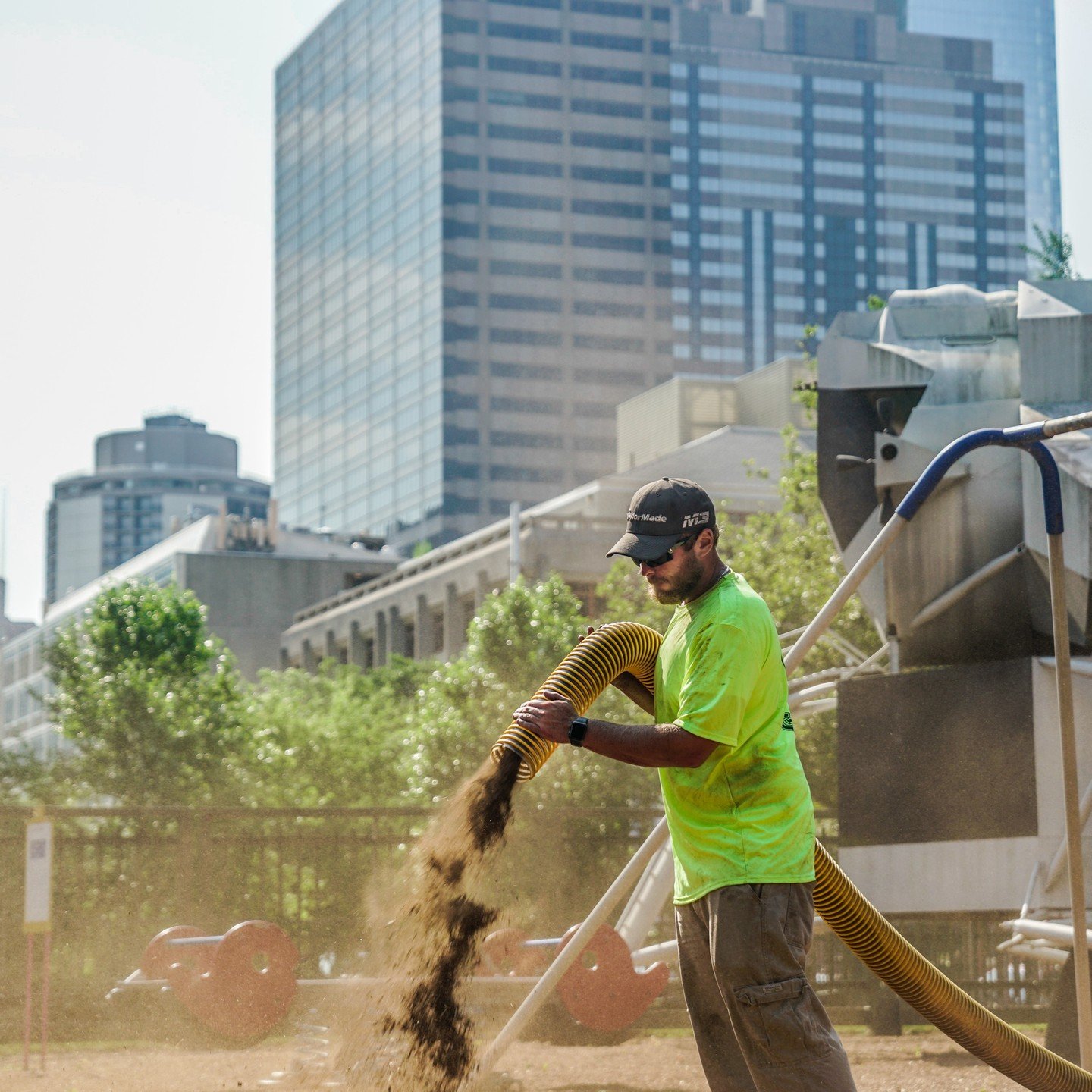 Unleash the power and efficiency of blowing mulch! #RooftopLandscaping #GreenSpaces #MulchBlowing #ExpressBlower #SoilBlowing
