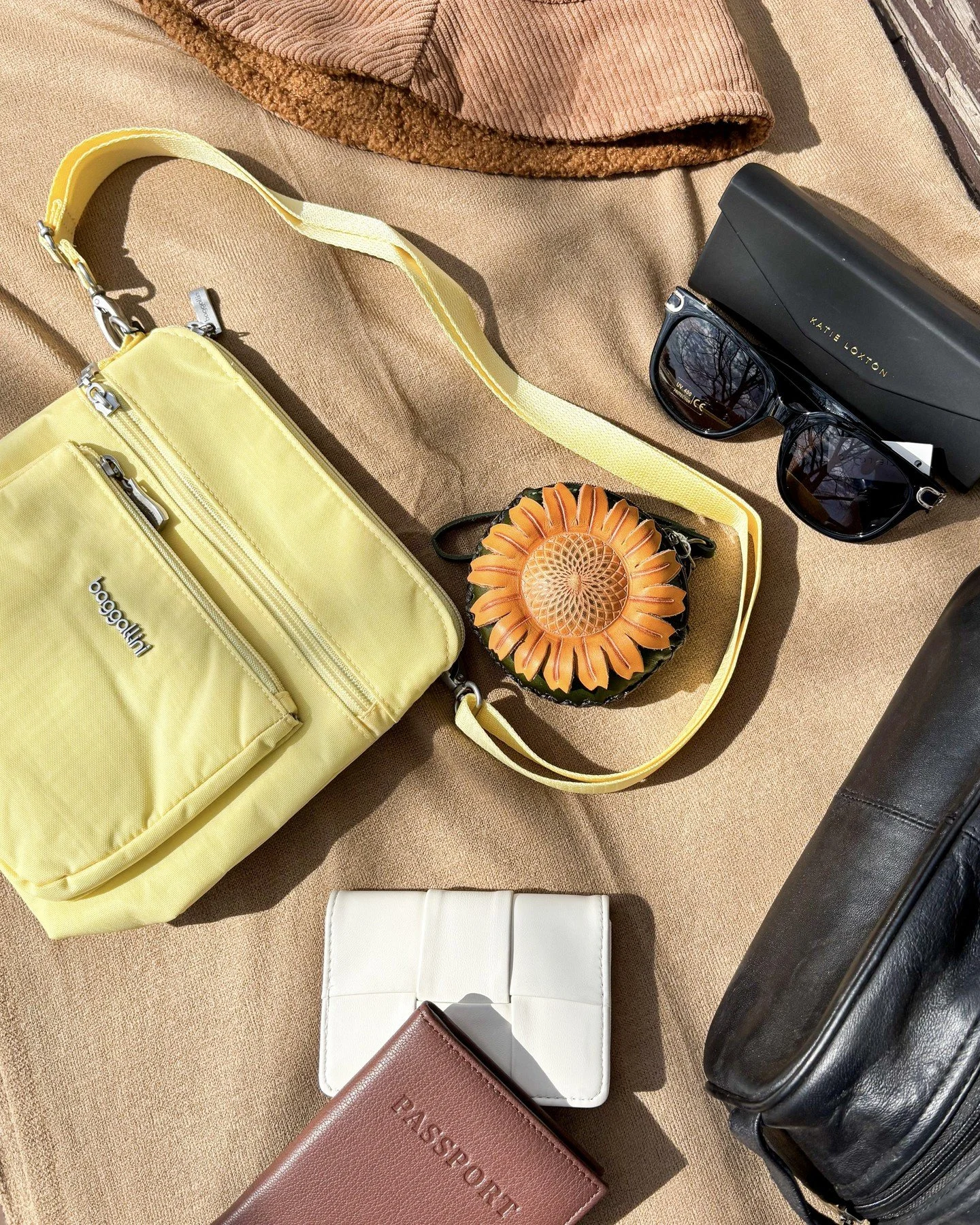Sunflowers packed and ready for the journey. ✈️ 🌻 These Sunflowers accessories are the perfect companions for your next adventure.

#SunflowersBoutique #TravelAccessories #FlatLayStyle #BoutiqueFinds #TravelInStyle