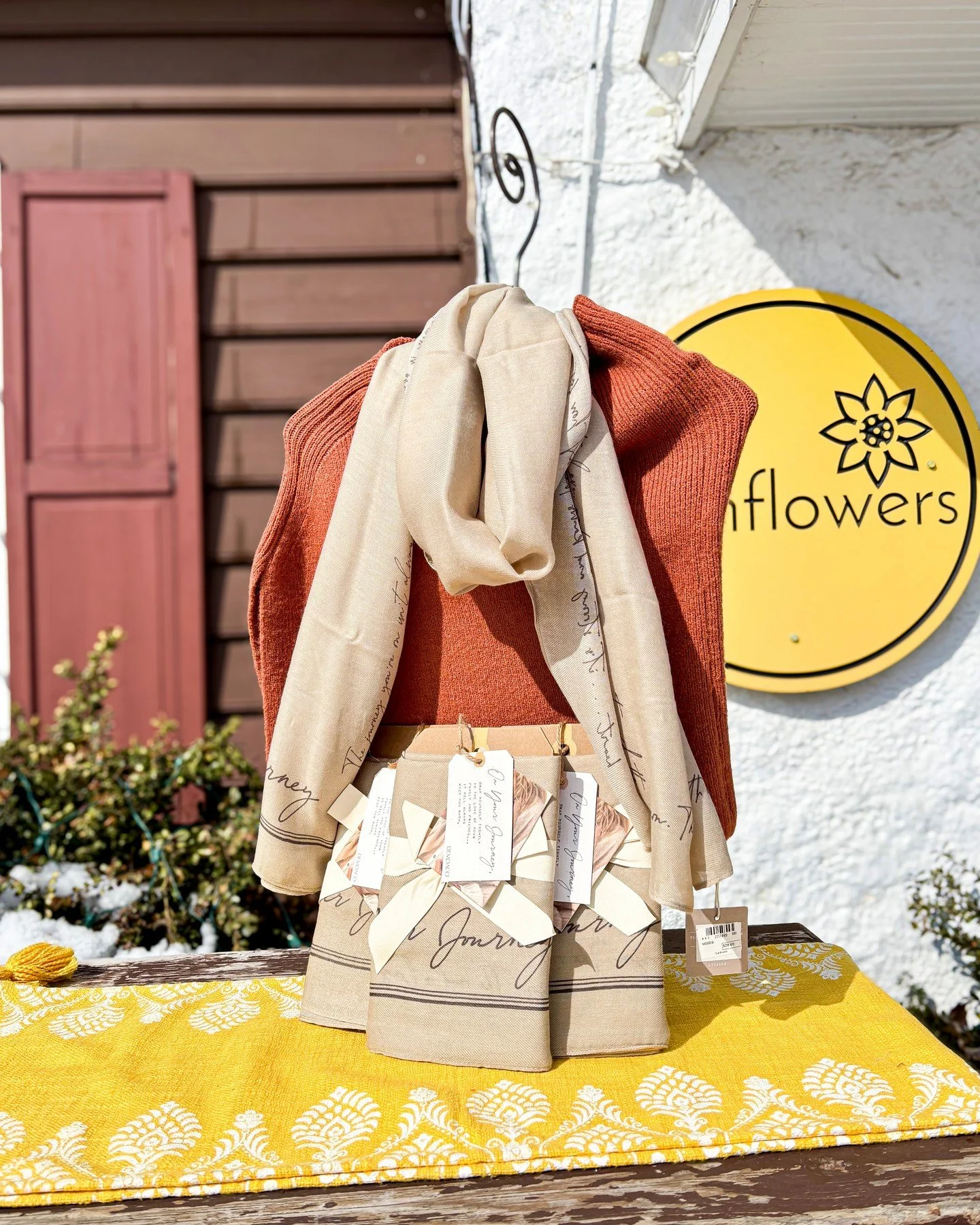 This Demdaco scarf is a heartfelt gift for yourself or someone you love. Designed to accompany you on every journey, it&rsquo;s illustrated with meaningful, letter-inspired expressions that gently remind us to pause, reflect, and savor the beauty in 