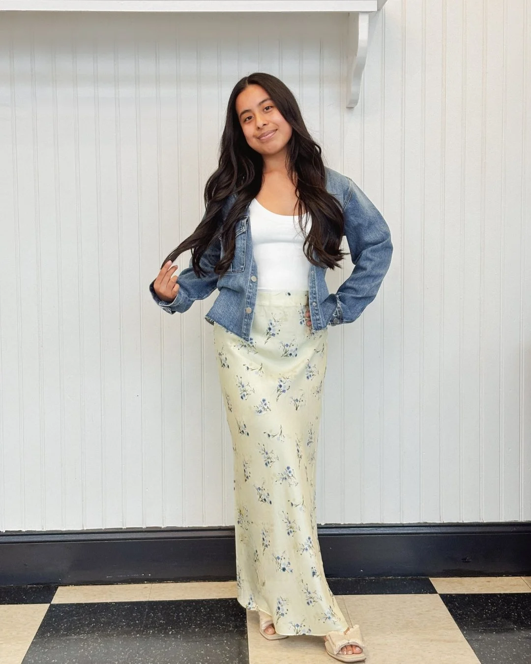 Refresh your spring wardrobe with timeless layers! Think sweaters draped over the shoulders and classic denim jackets. 🌿 ☀️

Stop by Sunflowers Boutique for your spring wardrobe inspiration!

Lora is wearing:

- Floral skirt: French Connection
- Bas
