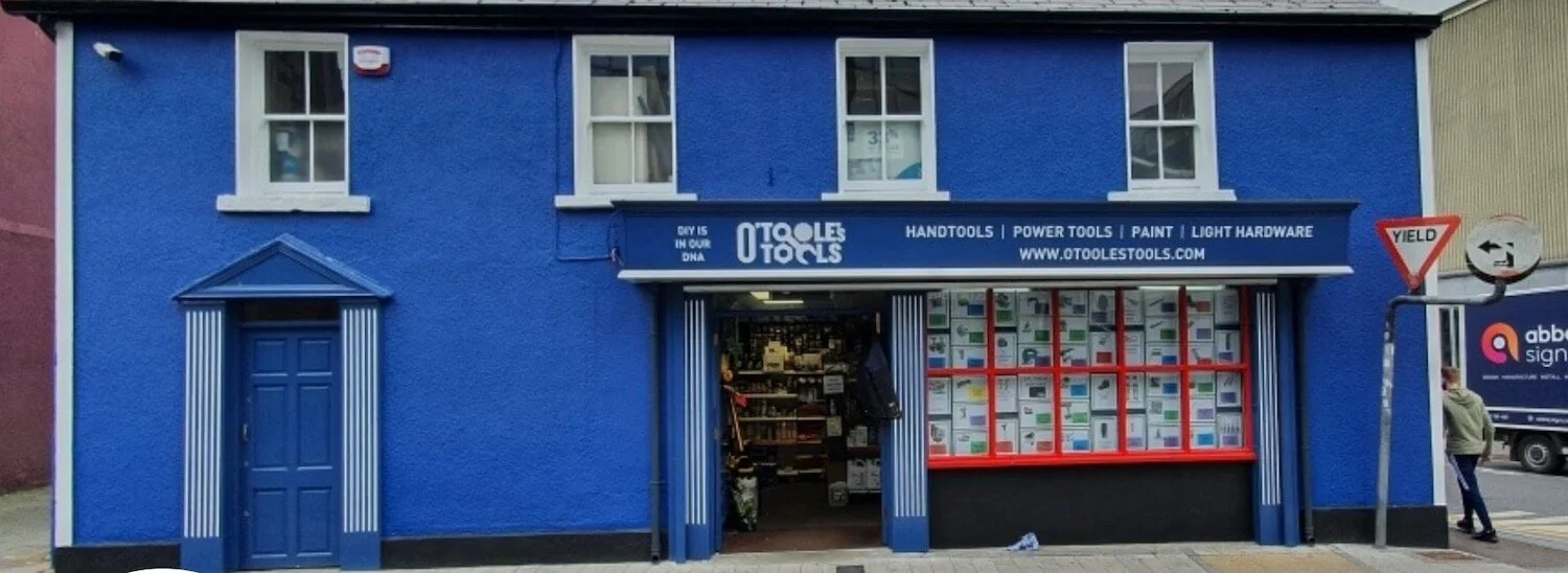 blue exterior of Otoole's Tools hardware store in Ireland