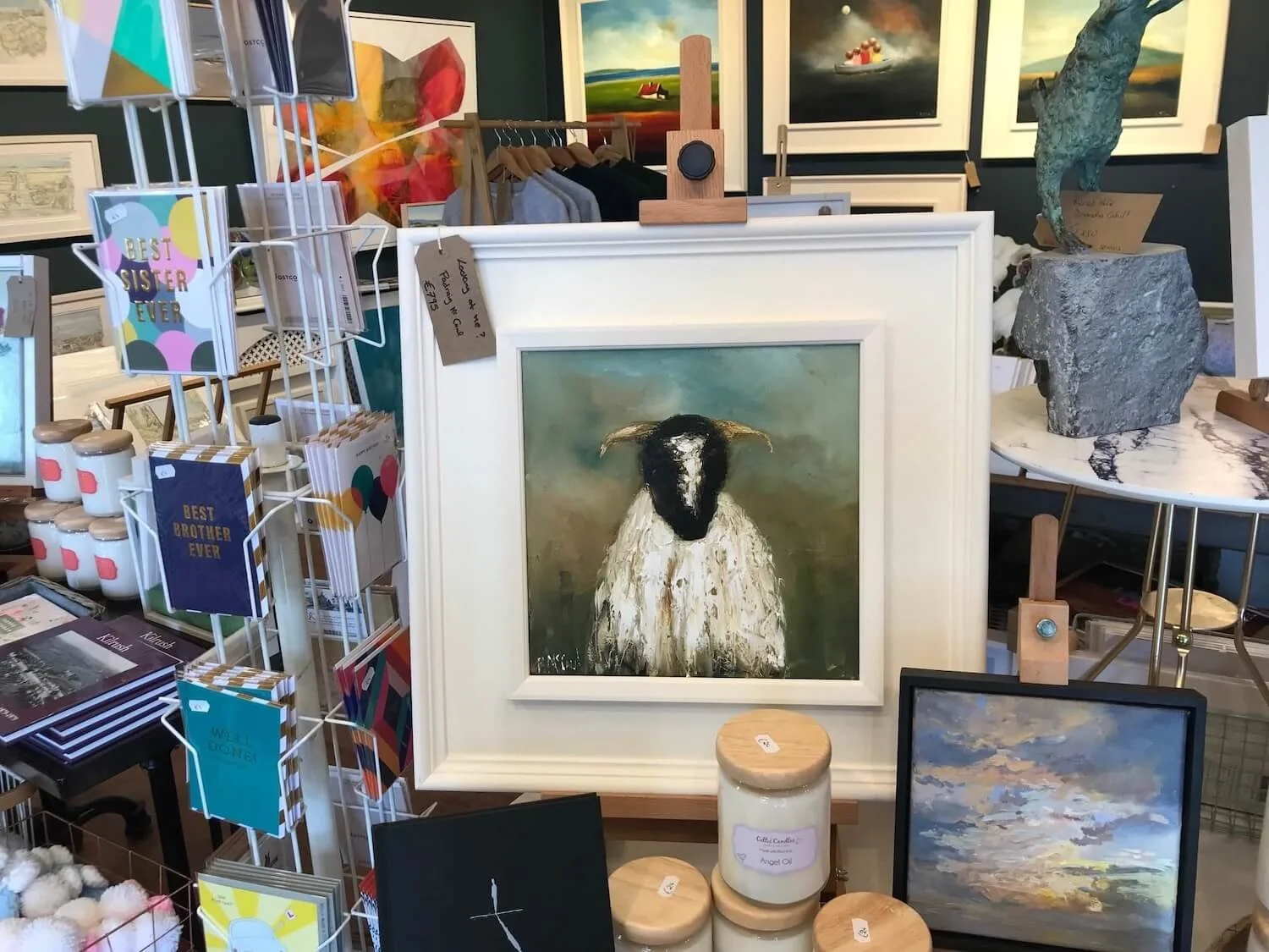 framed painting of a sheep in an an irish gift shop