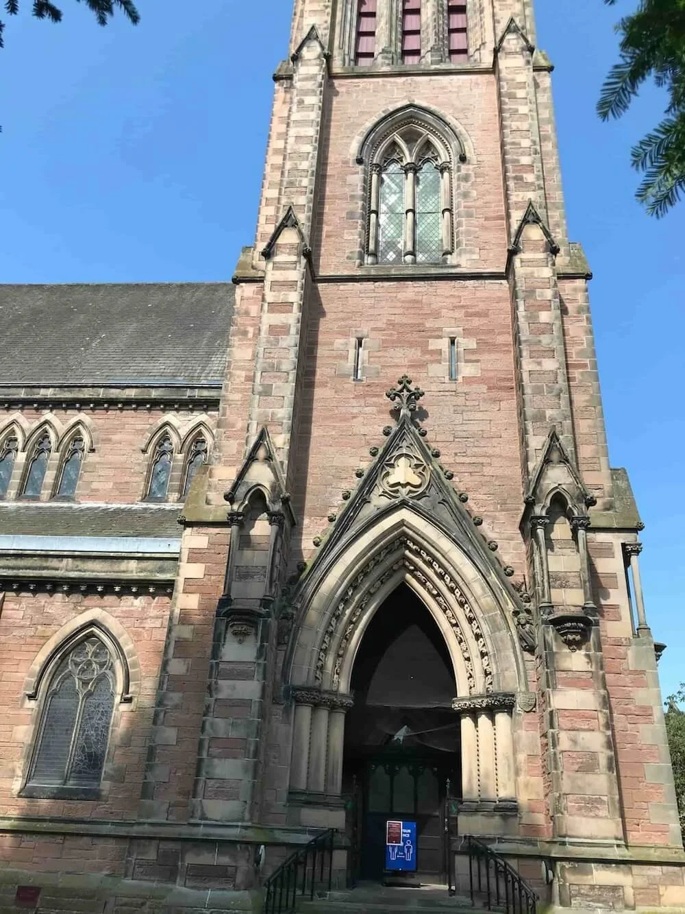exterior of Saint Andrew's Cathedral in front of a blue sky