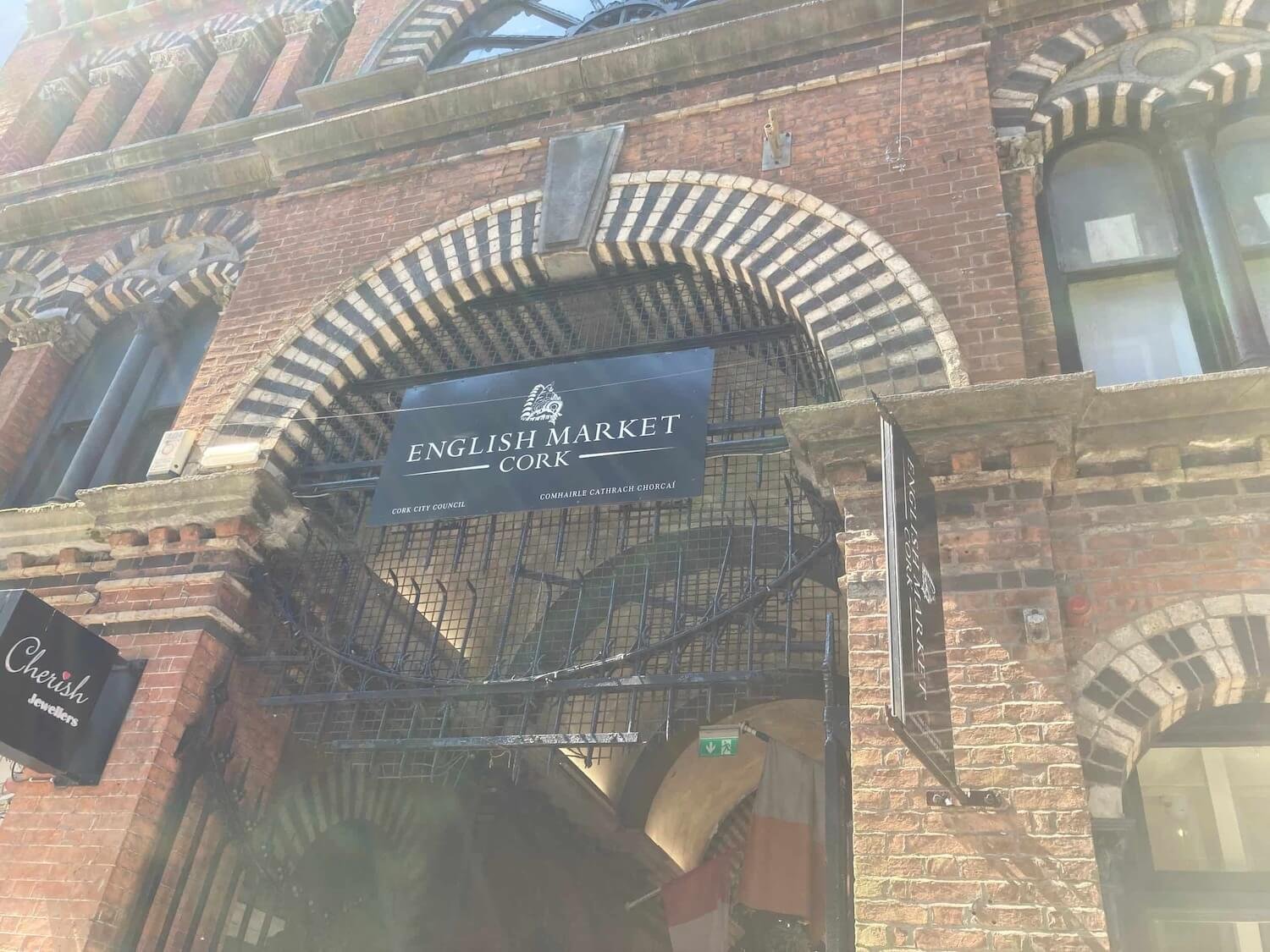 Entrance to English Market Cork with brick exterior and arched windows and doorways