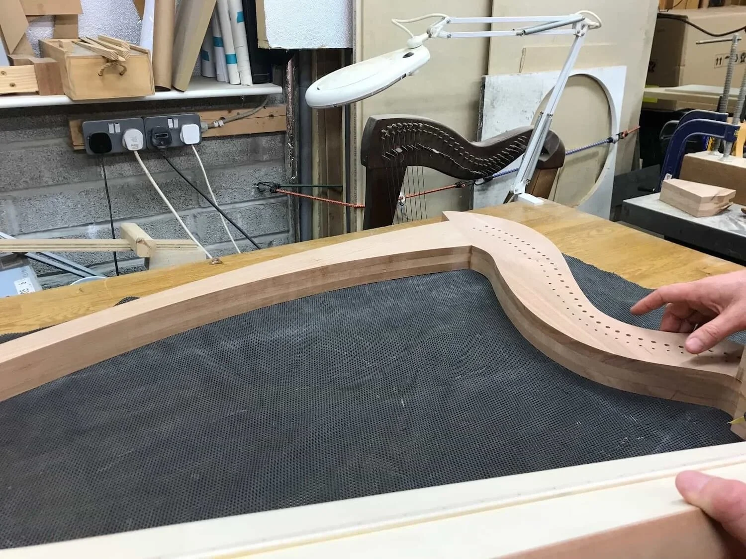 wood cutout that will become the harp