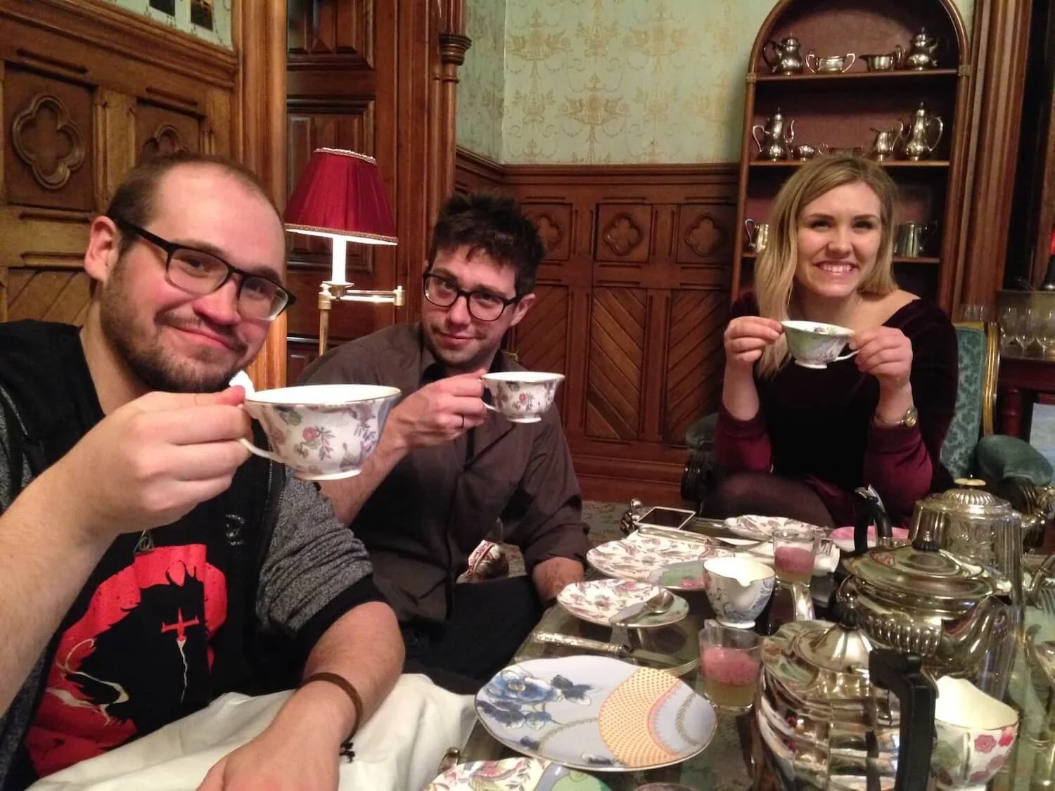 three people holding tea cups at Ashford castle