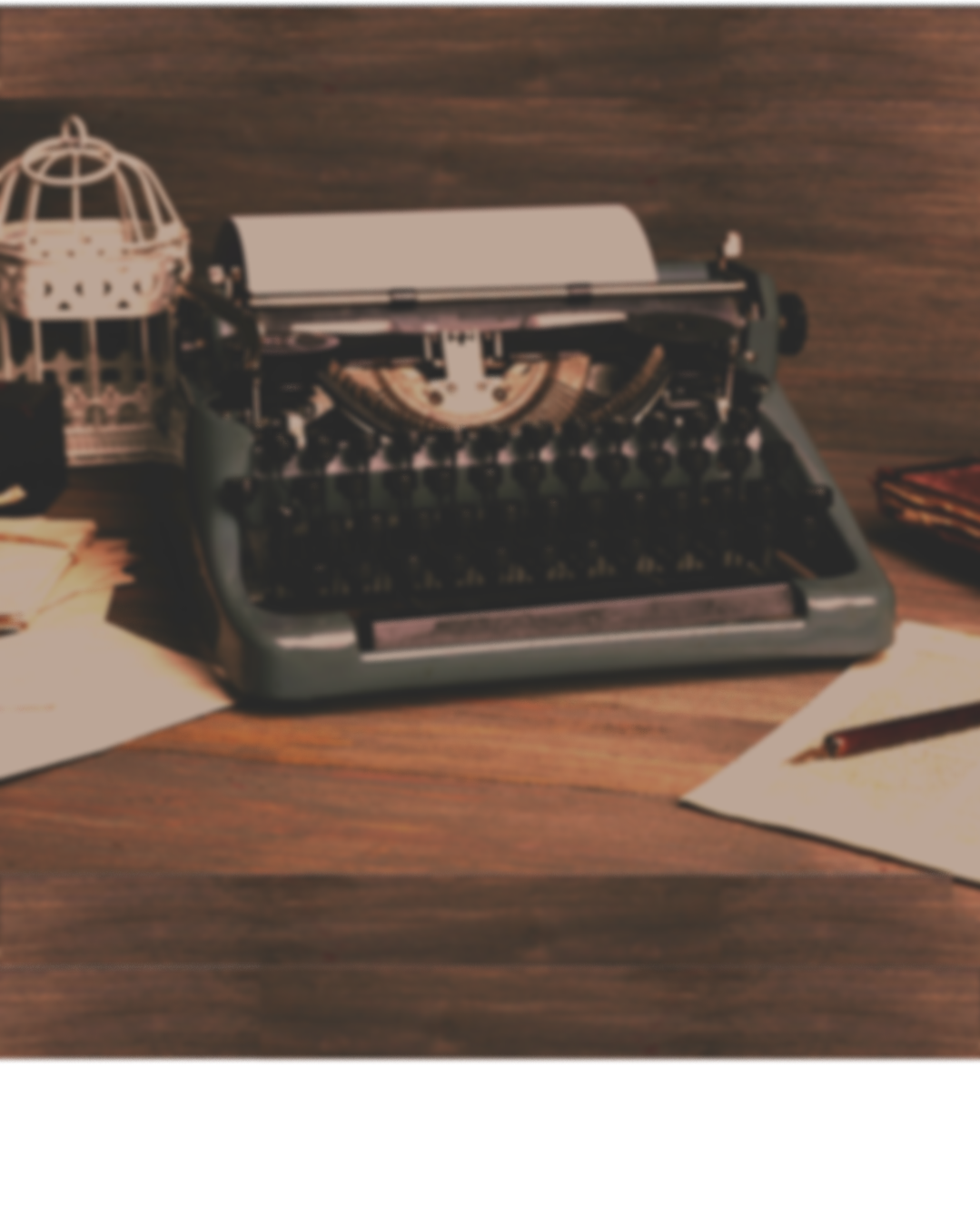 An old typewriter on a wooden desk, surrounded by sheets of paper, a fountain pen, and a small decorative birdcage.