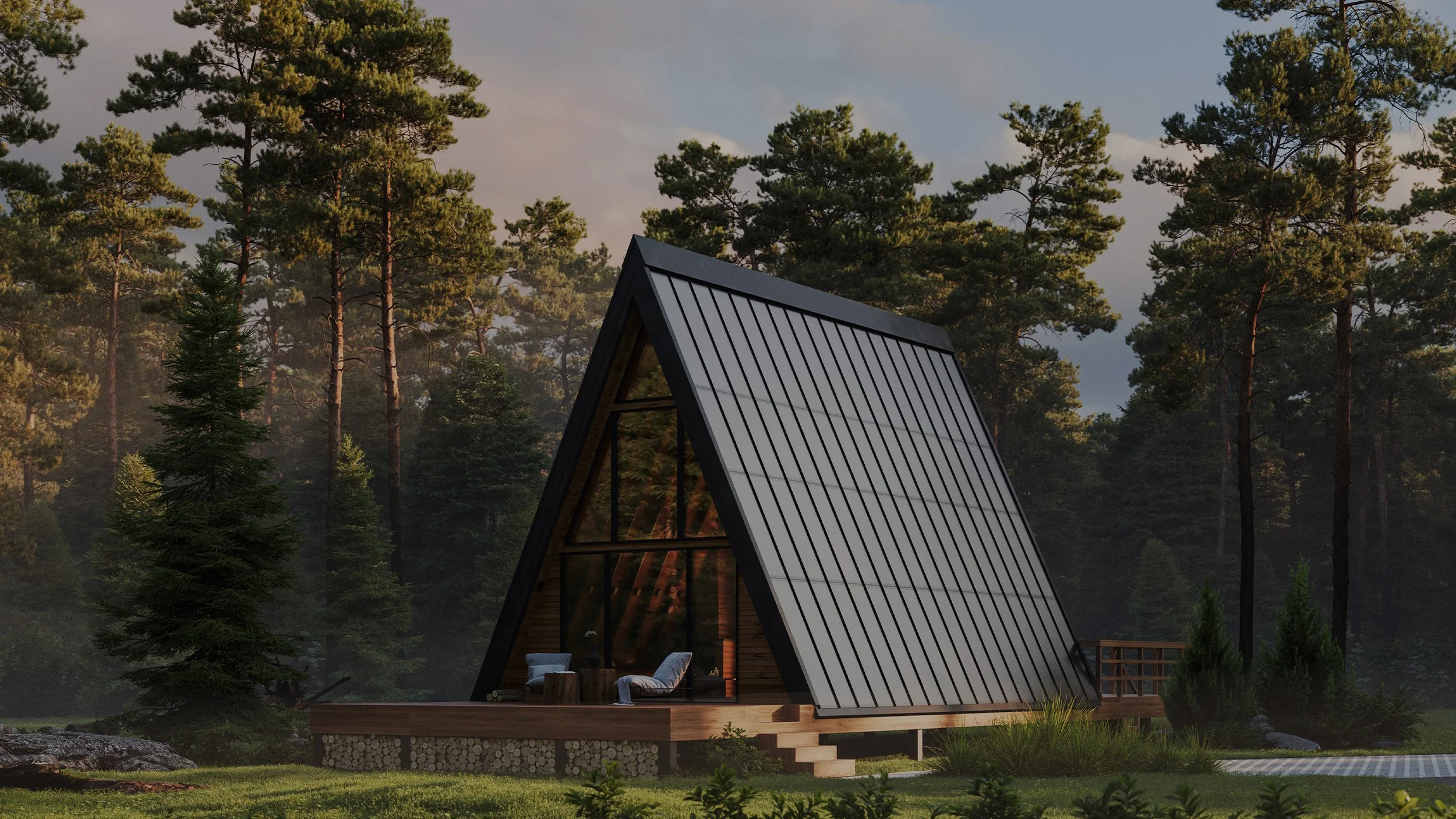 A-frame cabin in a forest setting, surrounded by pine trees, with a wooden deck and outdoor seating area.