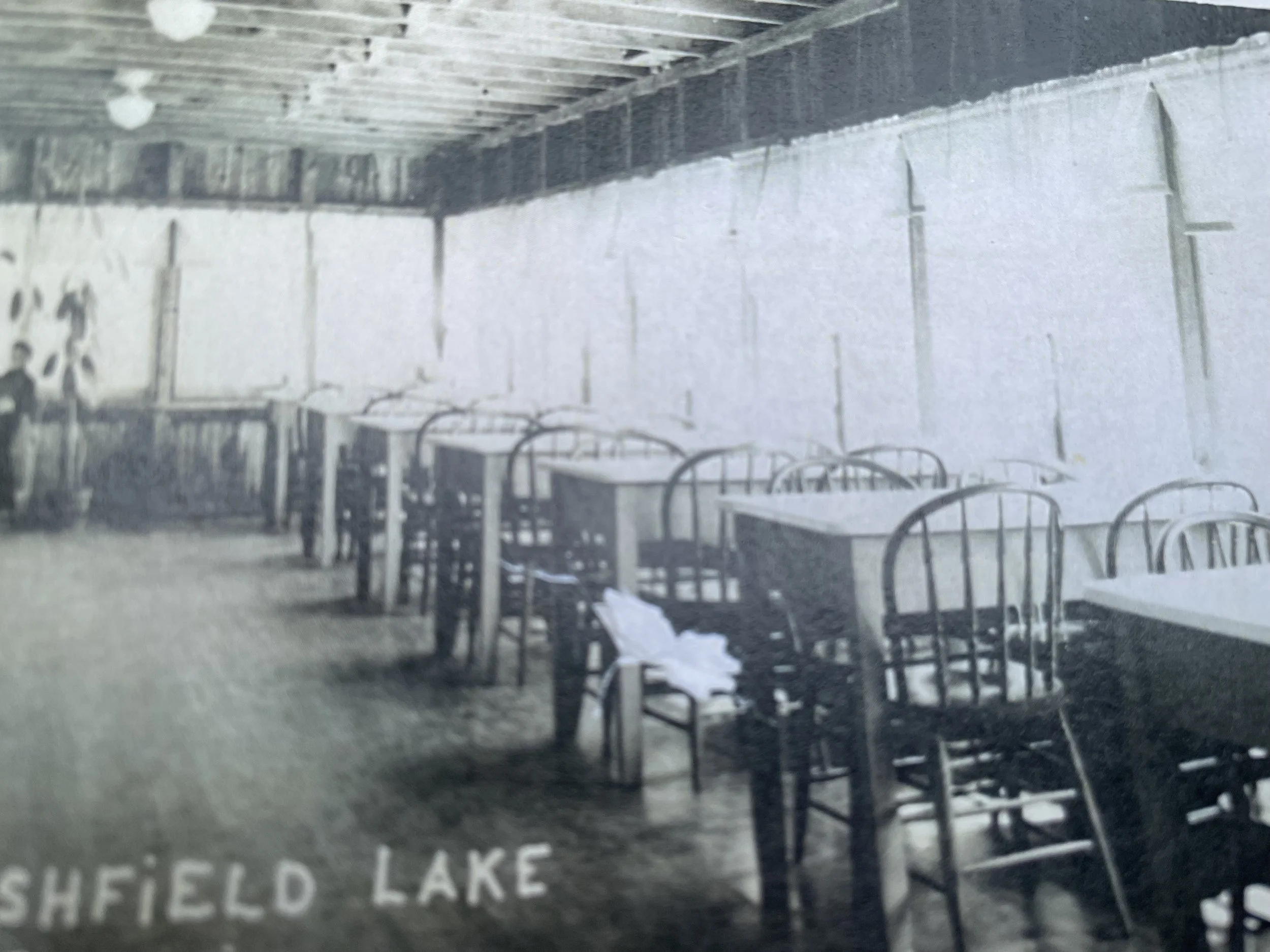 Ashfield Lake House back porch interior, lake view seating. (Photo courtesy of Susie Hanna, Paul & Carol Agrillo)