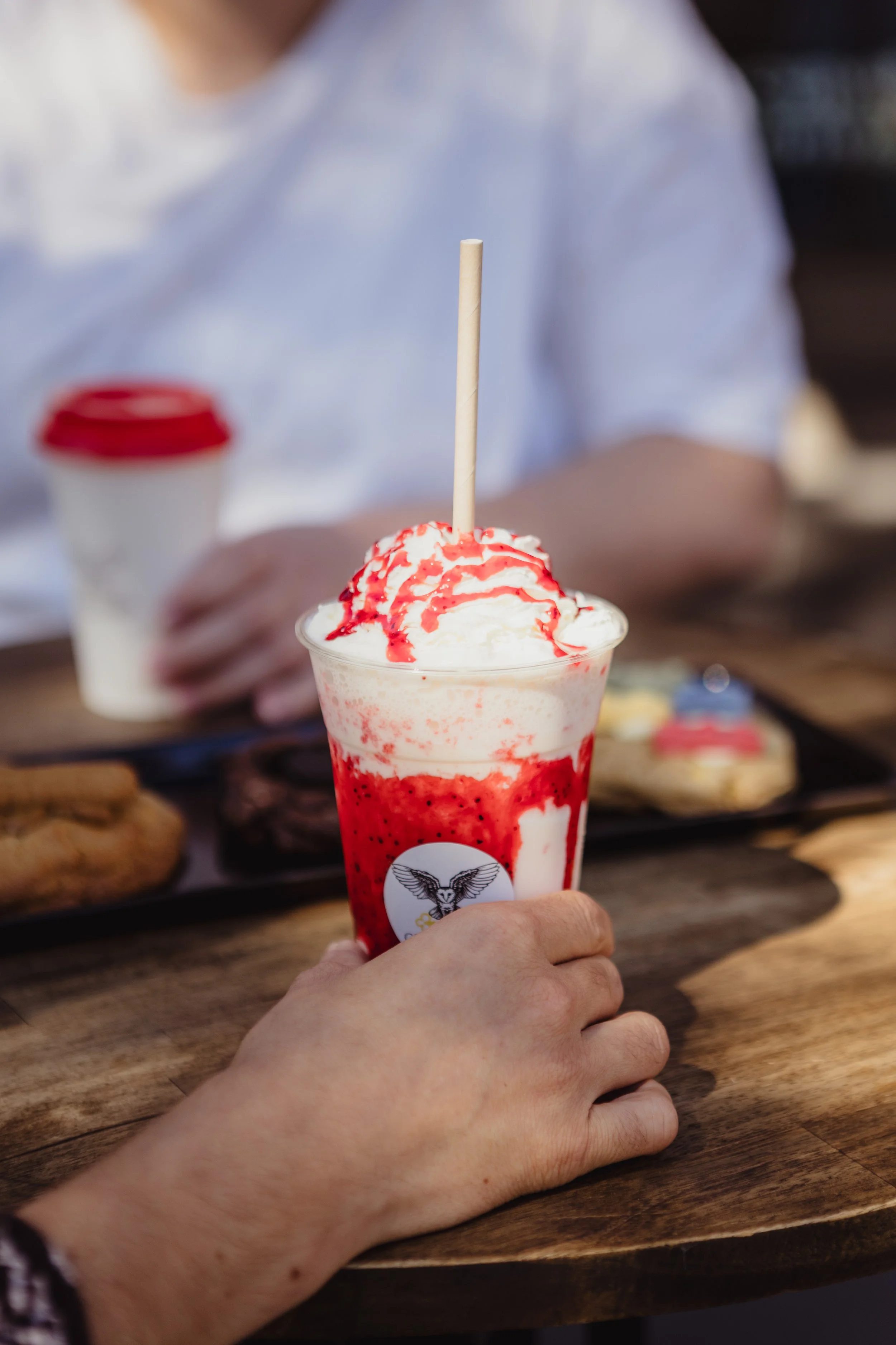 A strawberry frappe on a table 