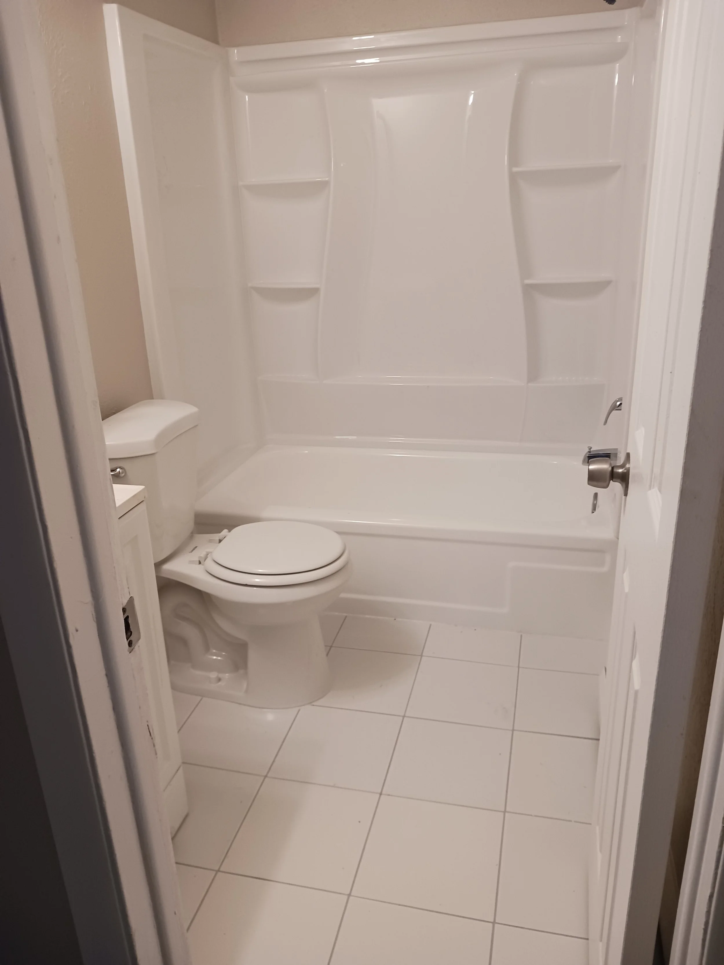 New shower kit & tile floor