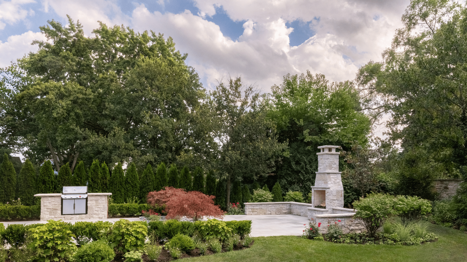Glenview IL Outdoor Living Space Paver Patio Grill Island Fireplace Privacy Landscaping pappas company construction landscape design landscaping