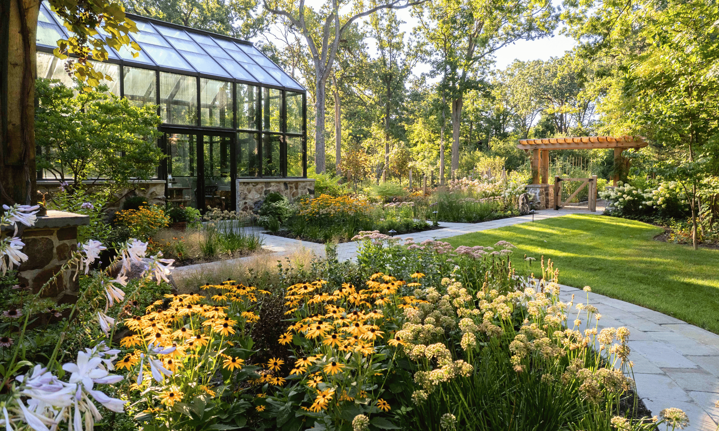 Riverwoods IL Greenhouse Stone Path Perennial Garden Pergola Entrance pappas company construction landscape design landscaping