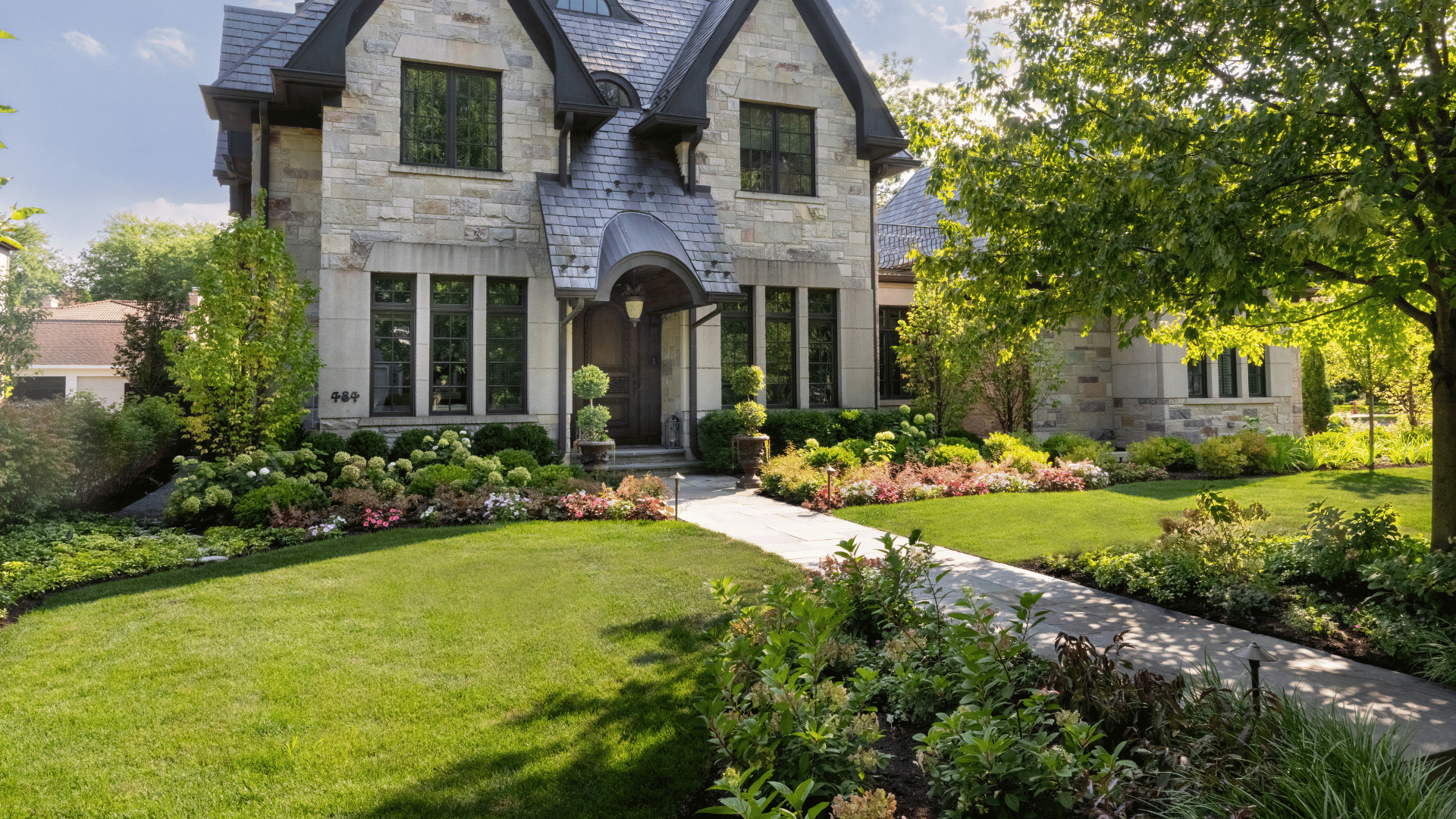 Winnetka IL Junker Residence Front Entry Landscape Design Stone Walkway Layered Beds pappas company construction landscape design landscaping