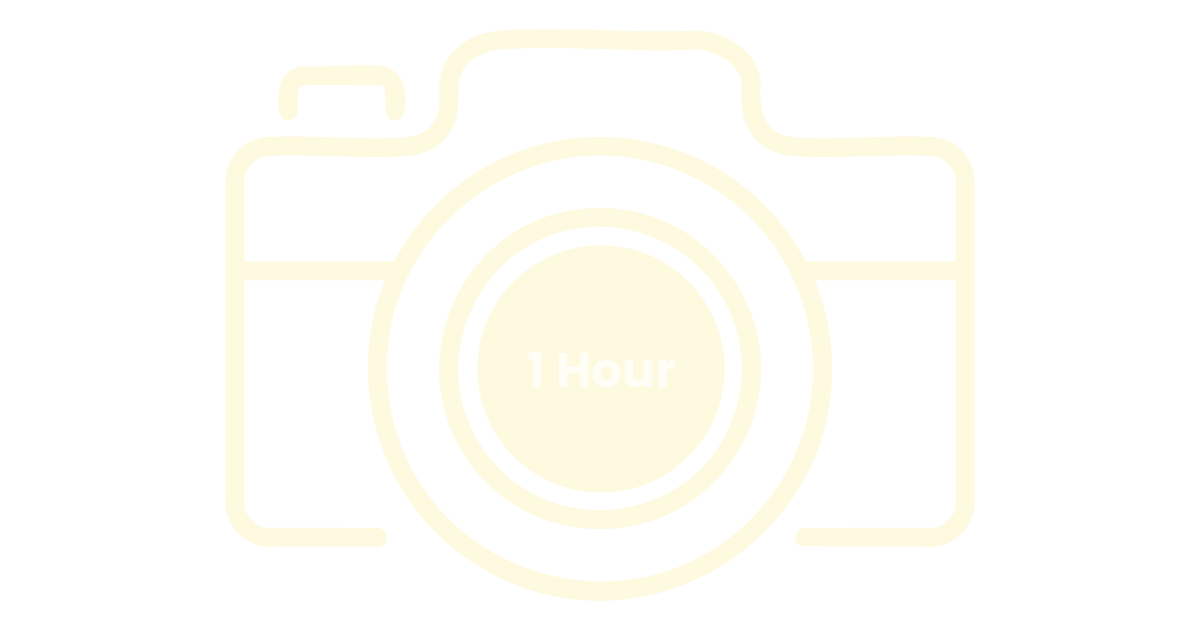 Outline drawing of a camera with a lens in the center.