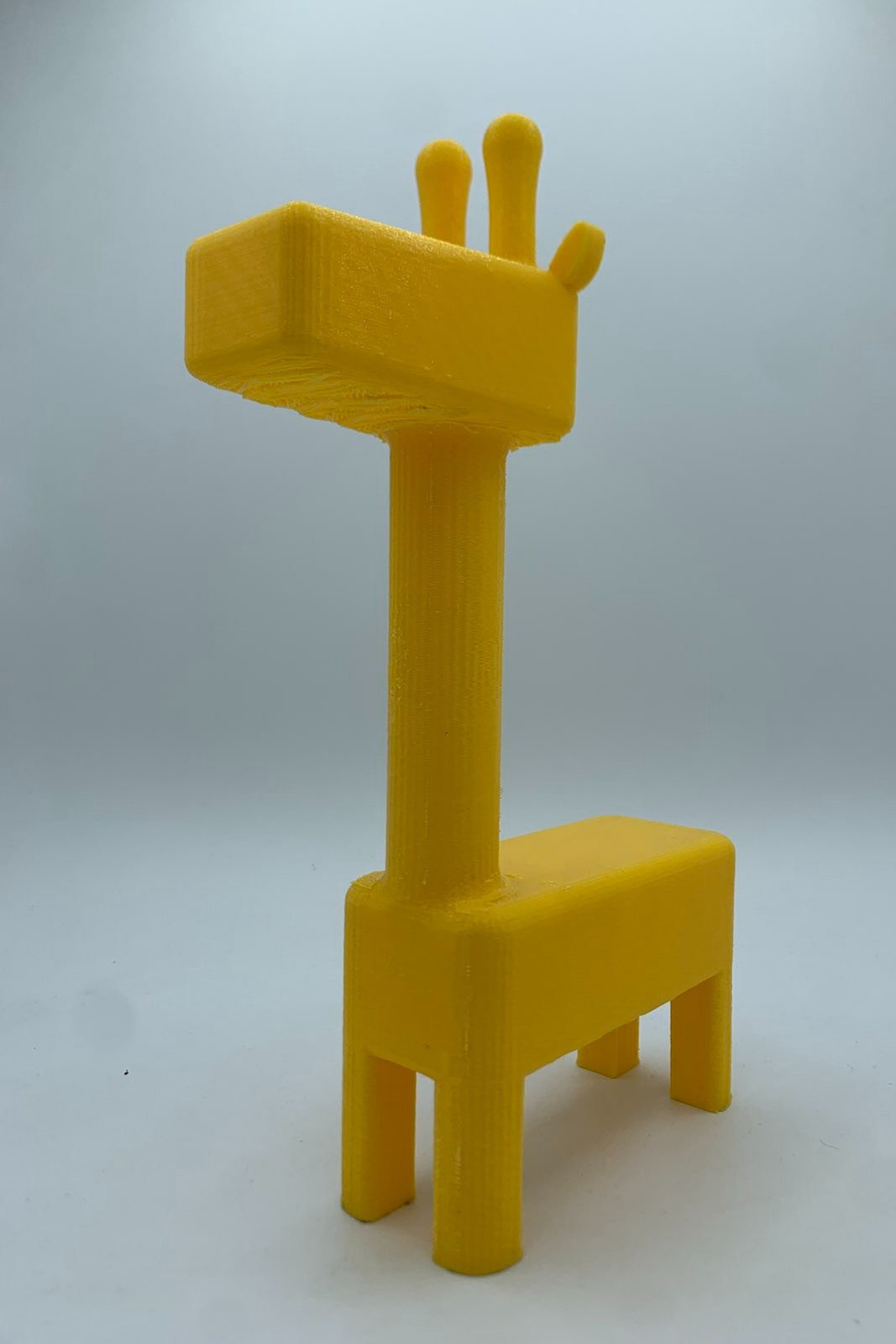 A blocky yellow giraffe