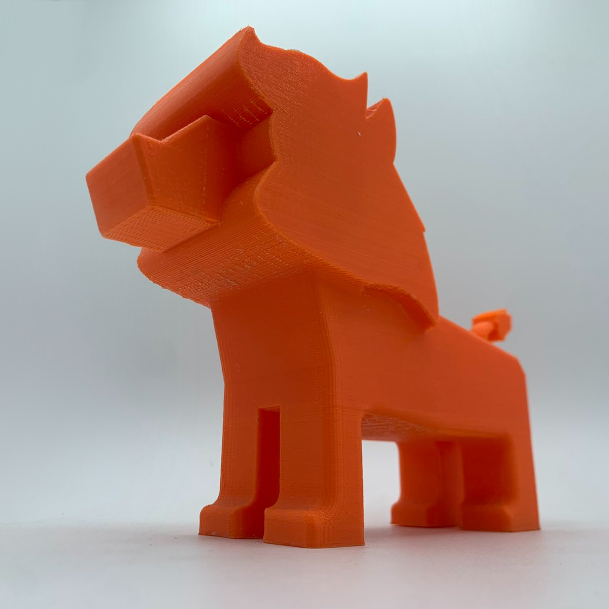 A rectangular lion with an organically-profiled mane