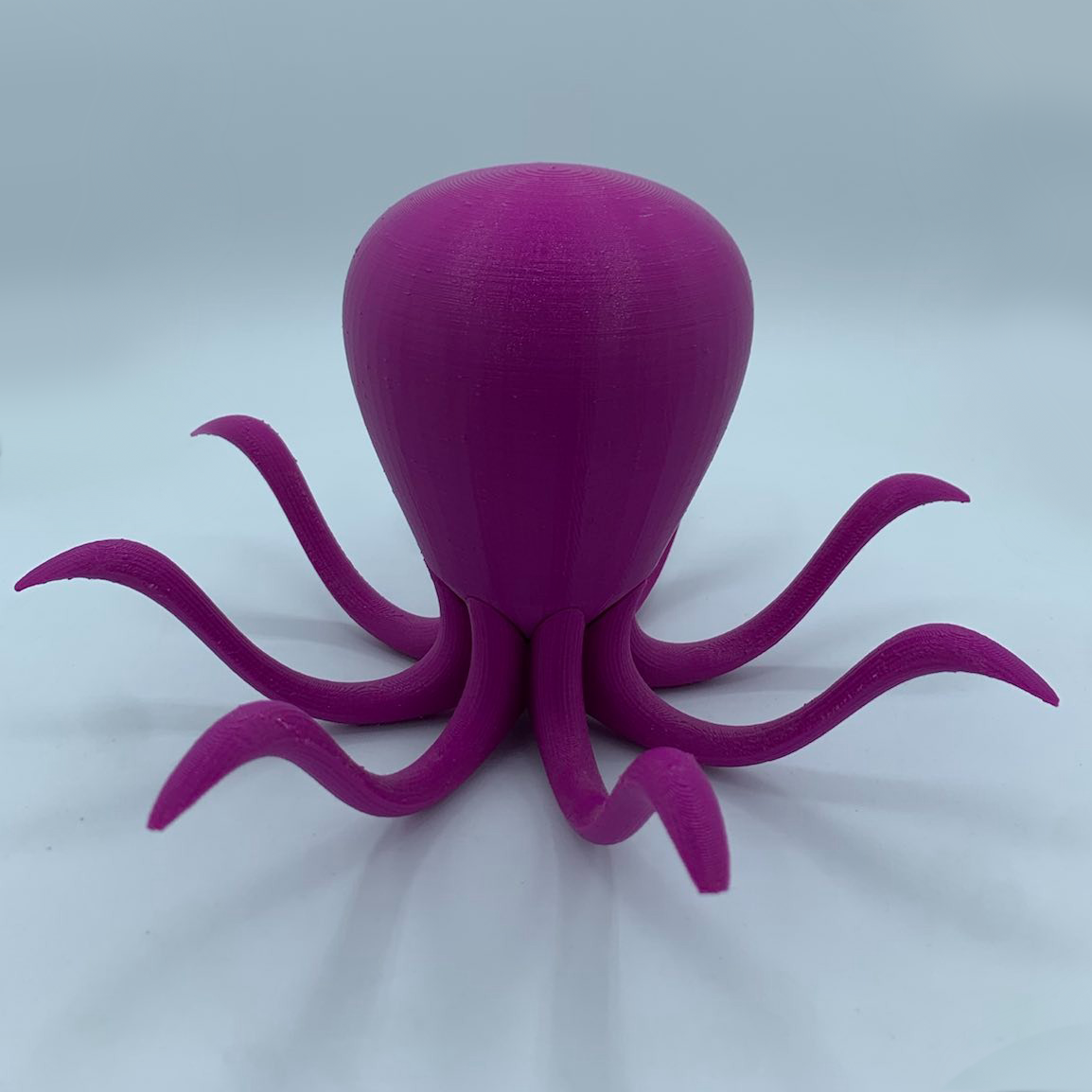 A faceless purple octopus