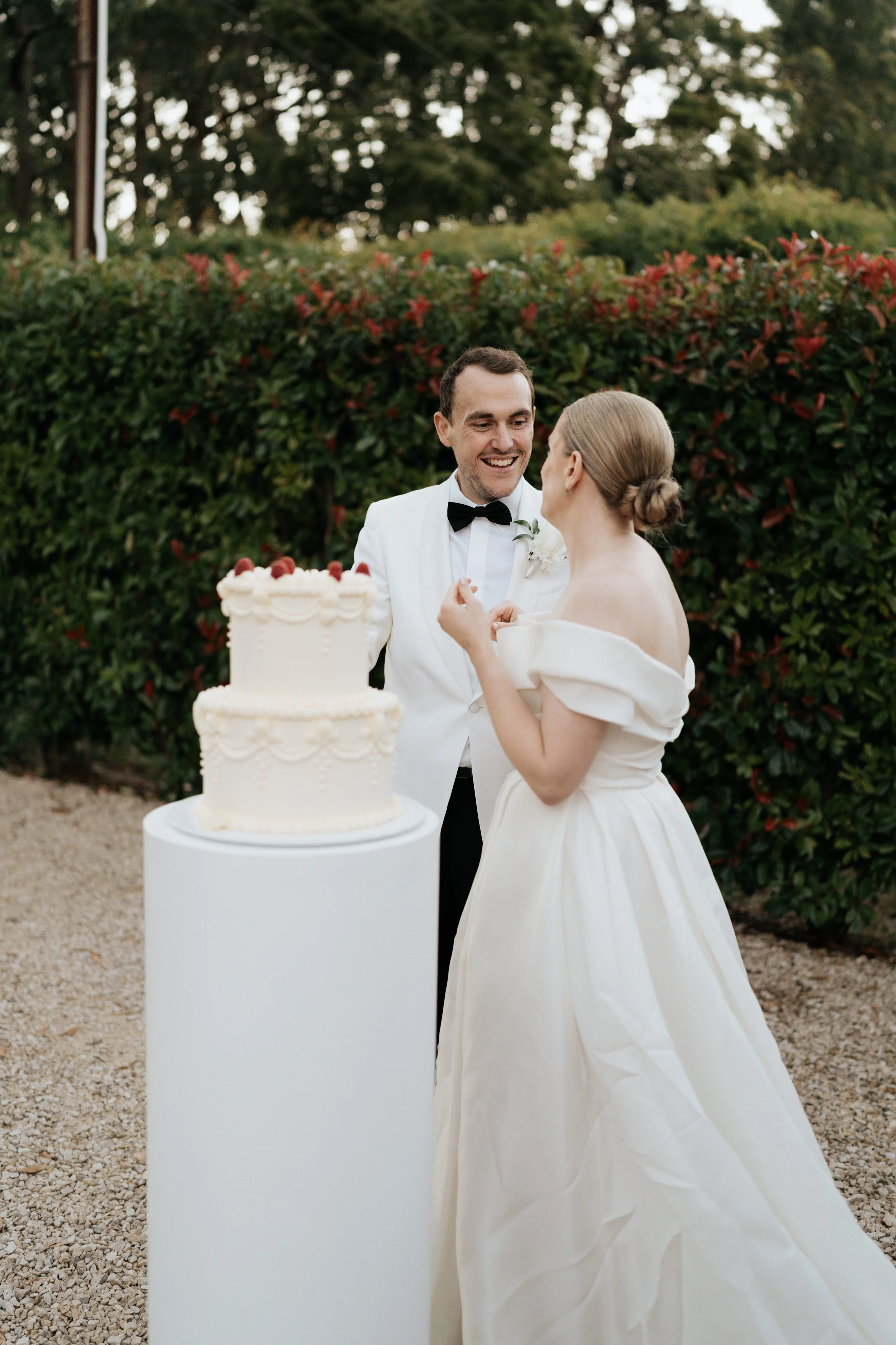 Beautifully catered wedding reception with shared plates, platters, and drinks service.