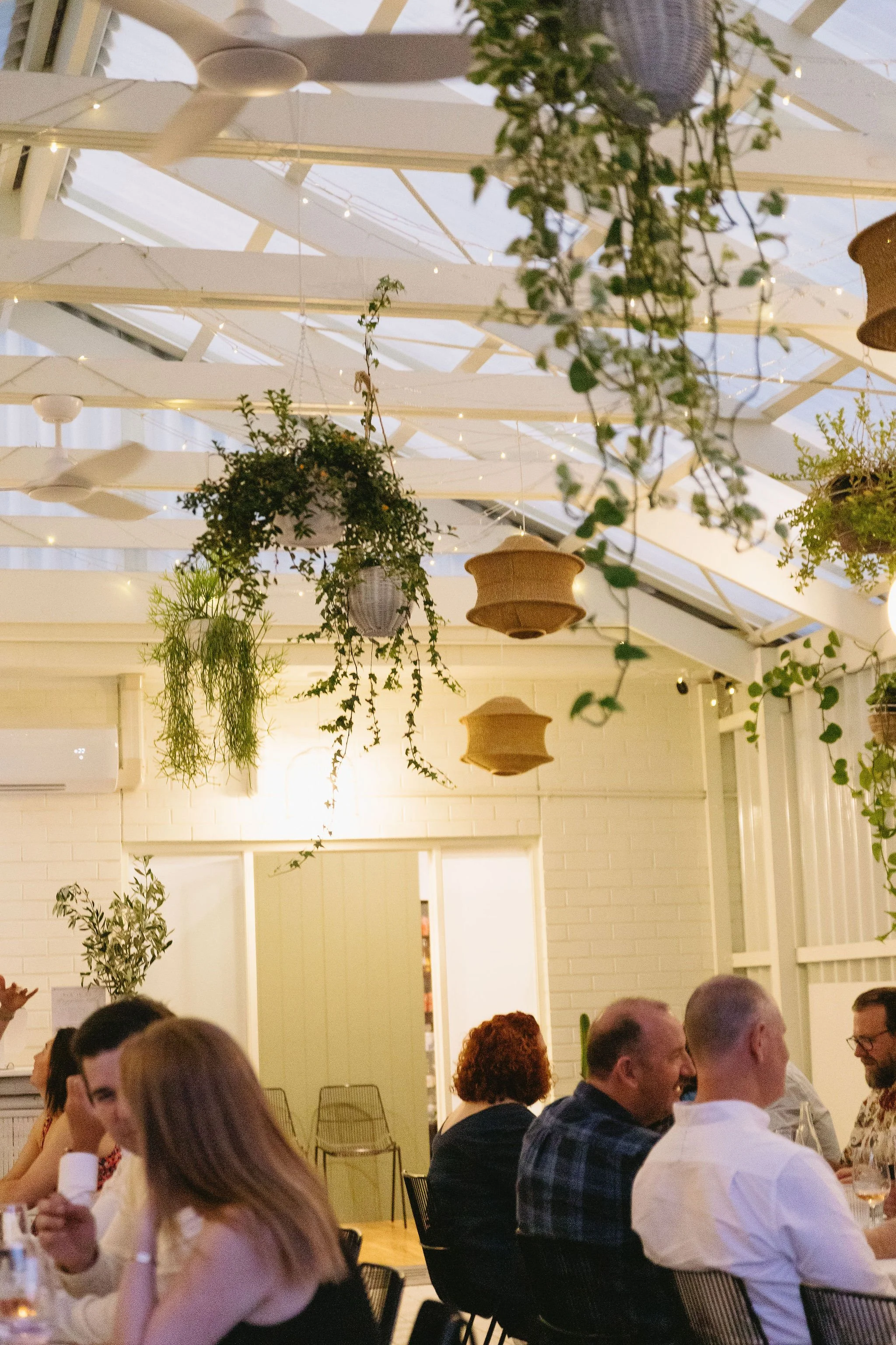 Guests enjoying shared platters and conversation at a celebration held at Sublime Social in Adelaide.