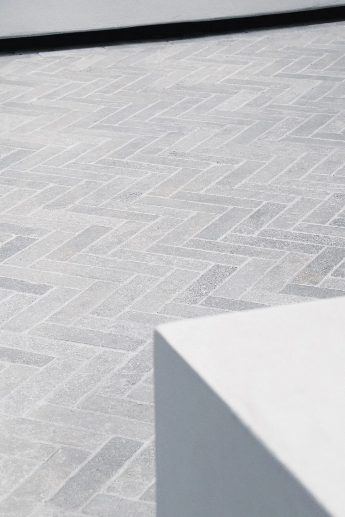 Herringbone outdoor tiling detail in high end landscape design, landscapers Sutherland Shire NSW