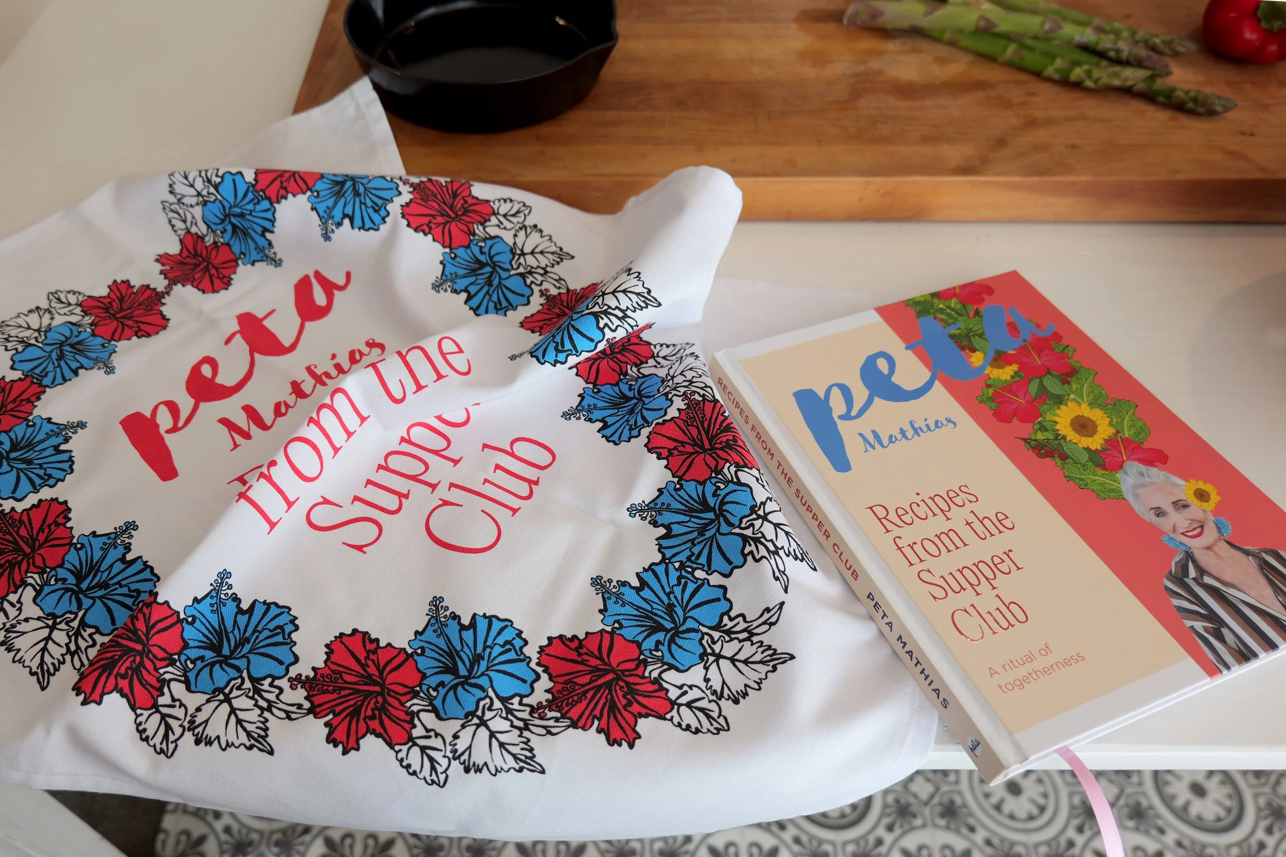 Peta Mathias tea towel and book.jpg